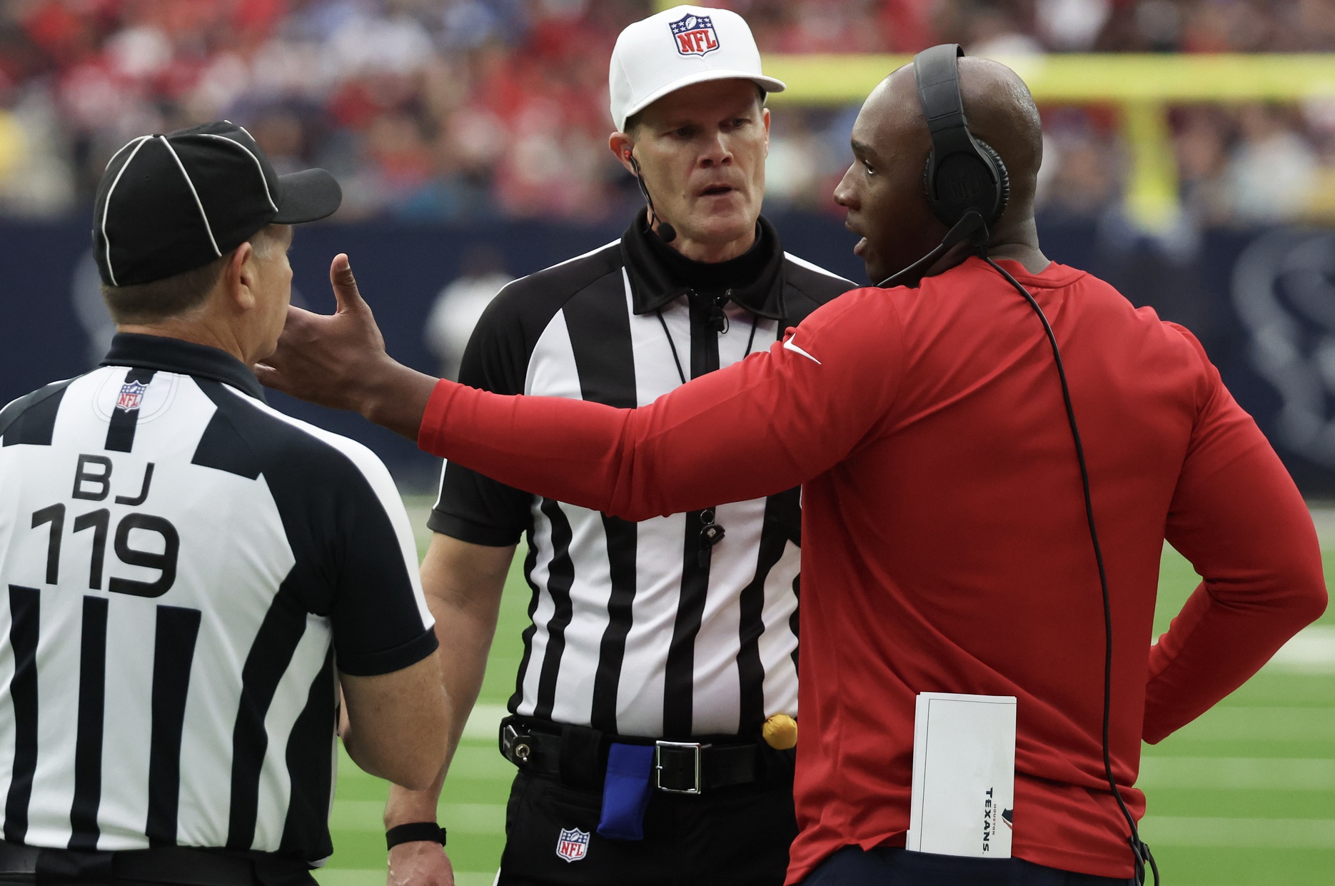 Houston Texans head coach DeMeco Ryans argues with the referee Clay Martin and back judge Greg Wilson on a pass interference call as the Texans play the Jacksonville Jaguars in the second half at NRG Stadium.