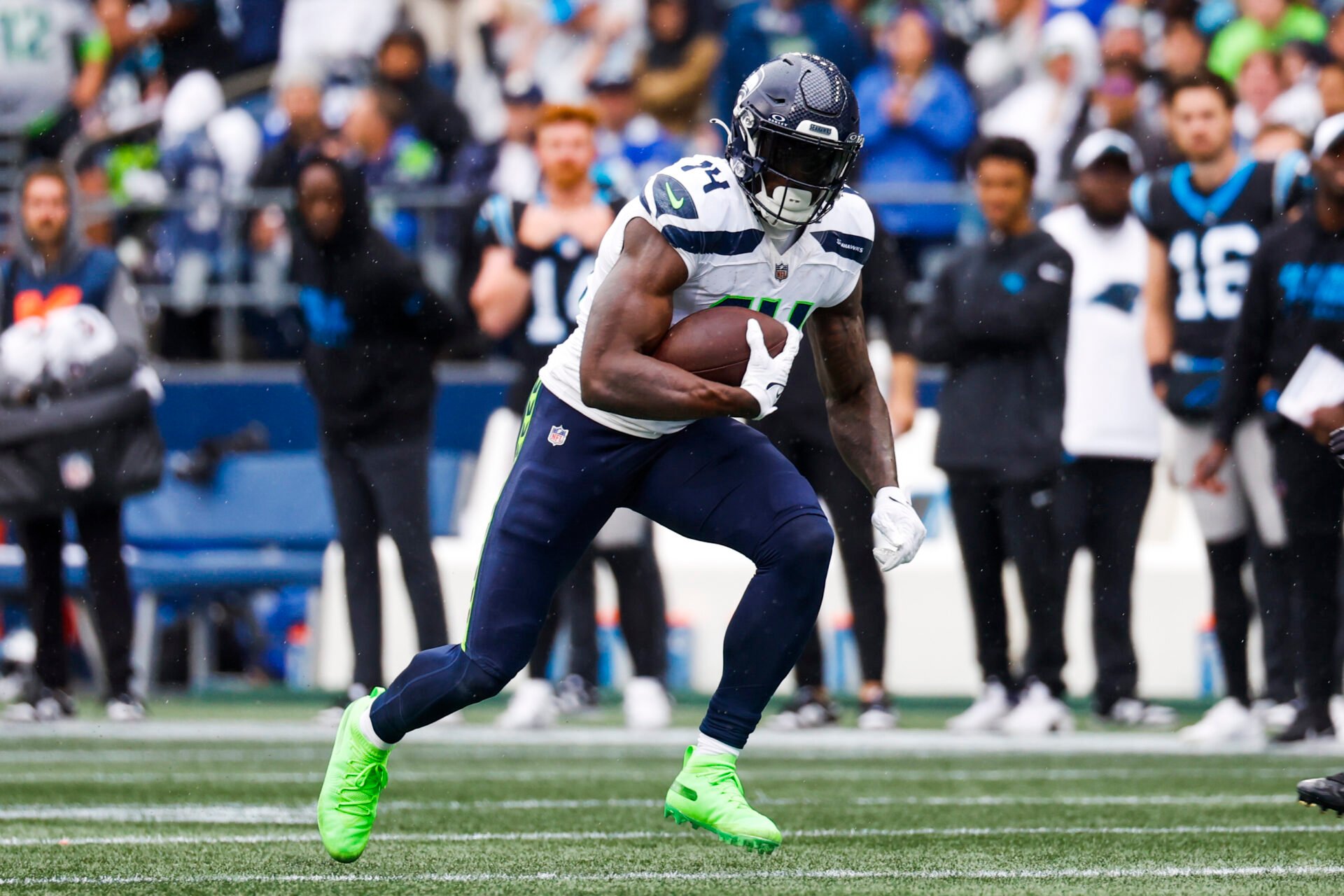 Seattle Seahawks wide receiver DK Metcalf (14) runs for yards after the catch against the Carolina Panthers during the second quarter at Lumen Field.