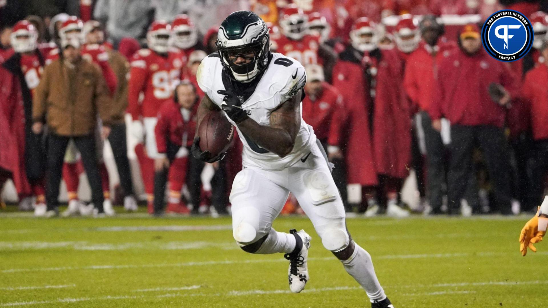 Philadelphia Eagles running back D'Andre Swift (0) runs the ball against the Kansas City Chiefs during the game at GEHA Field at Arrowhead Stadium.