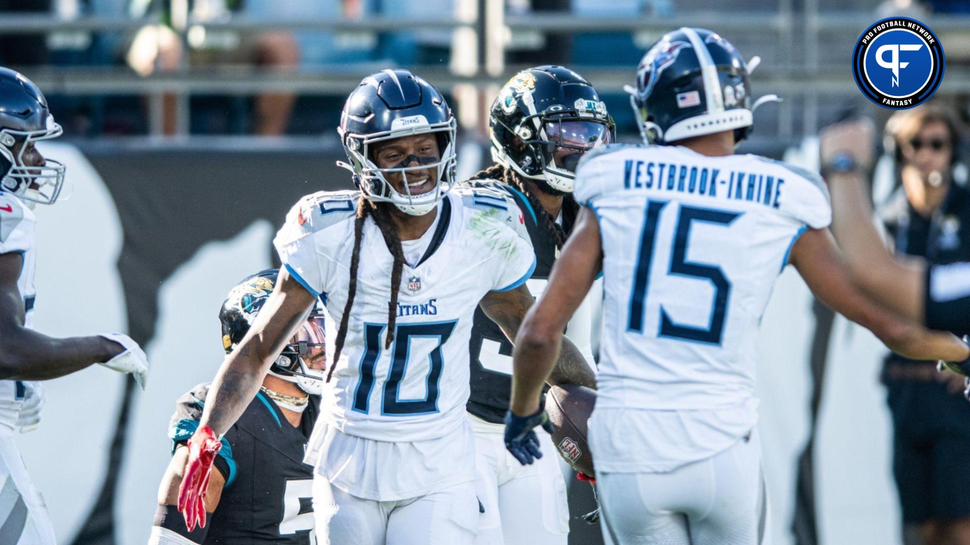 Tennessee Titans wide receiver DeAndre Hopkins (10) celebrates the touchdown with Tennessee Titans wide receiver Nick Westbrook-Ikhine (15) against the Jacksonville Jaguars in the third quarter at EverBank Stadium.