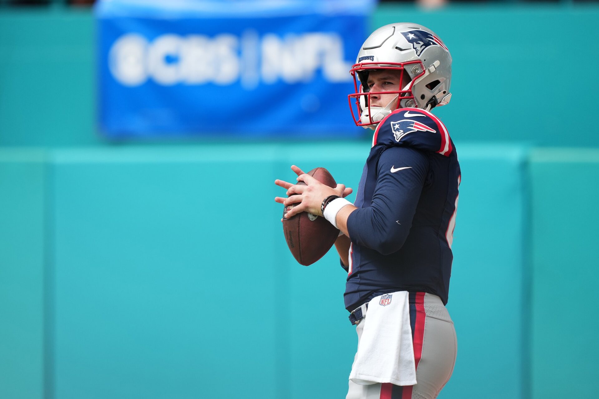 New England Patriots QB Bailey Zappe (4) warms up prior to a game against the Miami Dolphins.