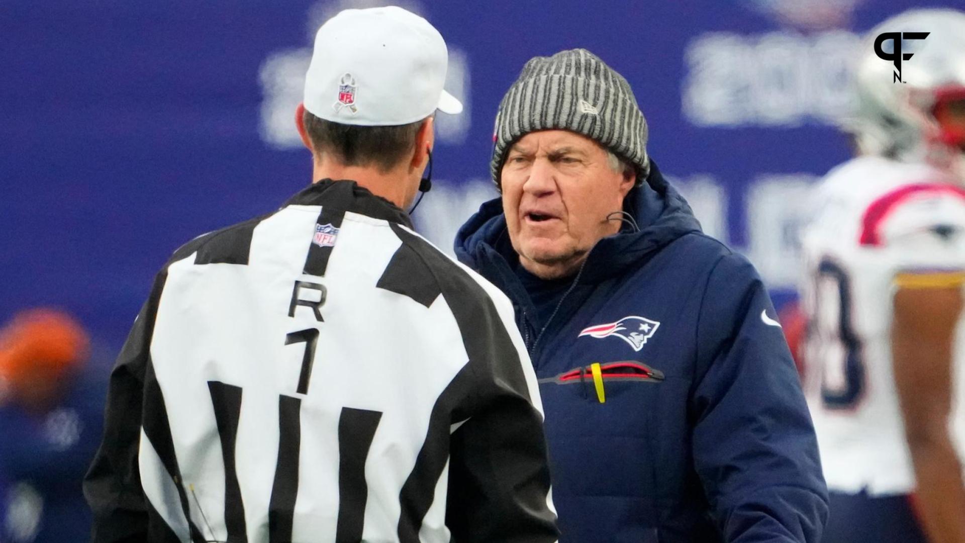 New England Patriots head coach Bill Belichick talks to referee Scott Novak (1) at MetLife Stadium.