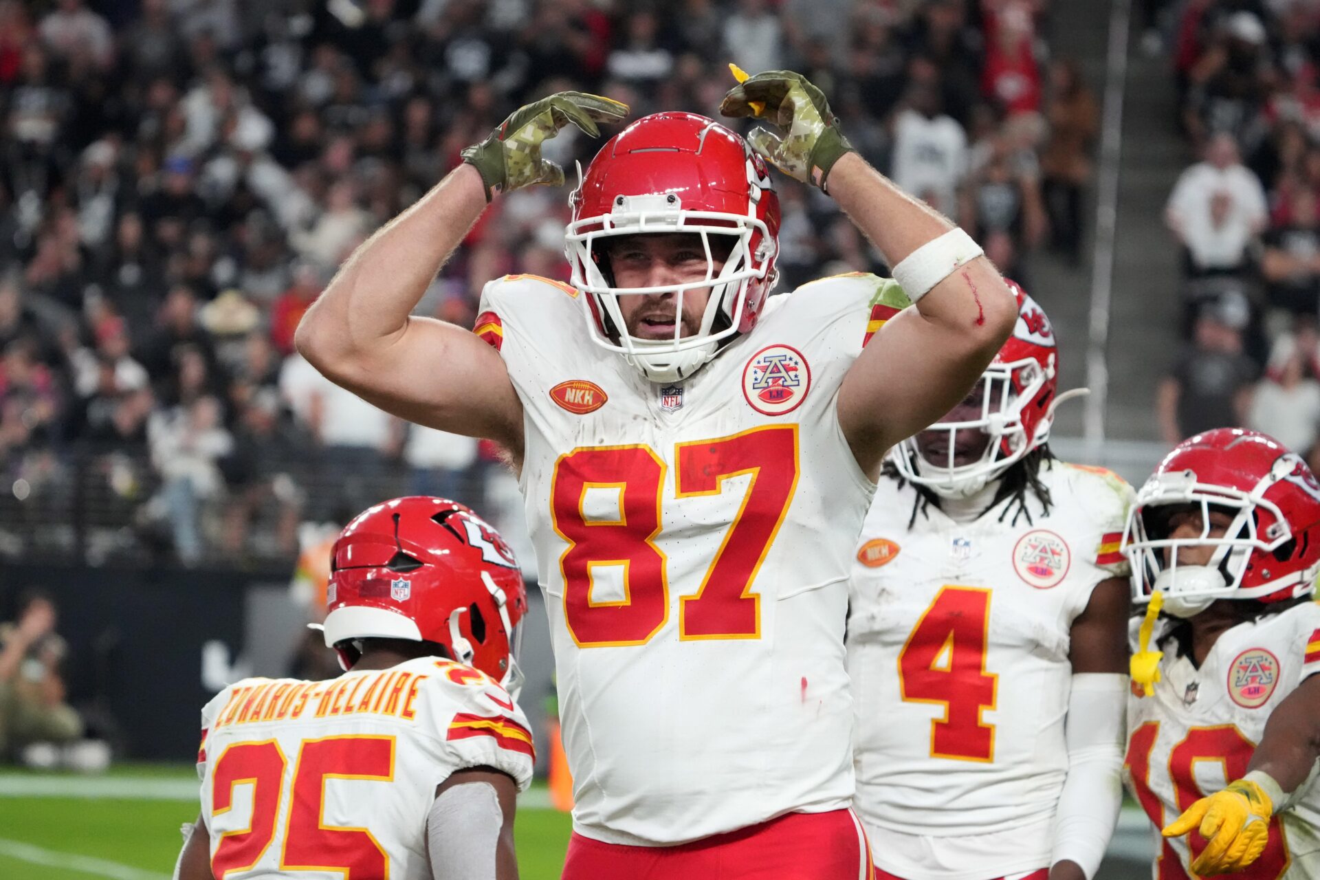 Kansas City Chiefs tight end Travis Kelce (87) celebrates after a Chiefs touchdown against the Las Vegas Raiders in the second half at Allegiant Stadium.