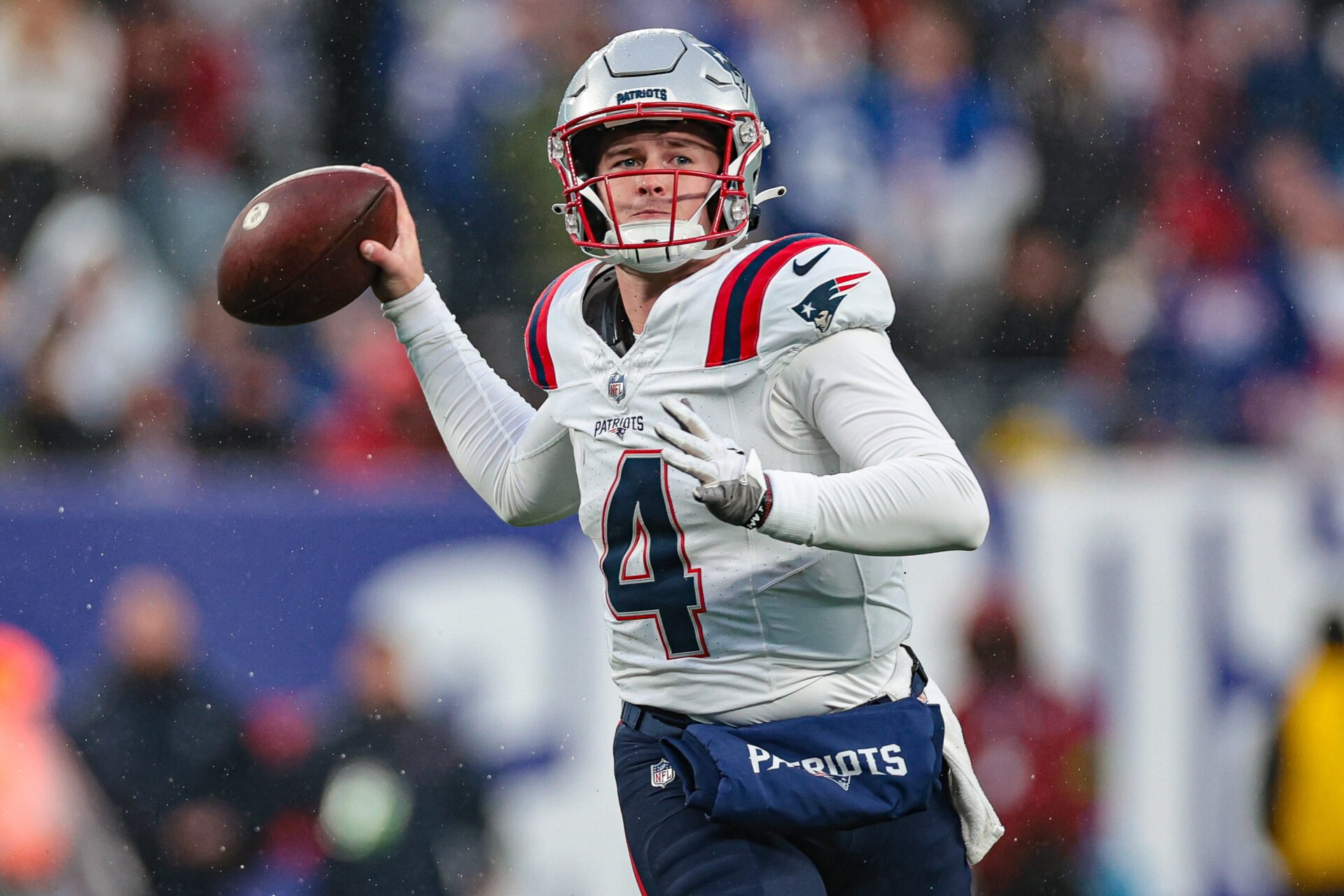 New England Patriots quarterback Bailey Zappe (4) throws the ball during the second half against the New York Giants at MetLife Stadium.