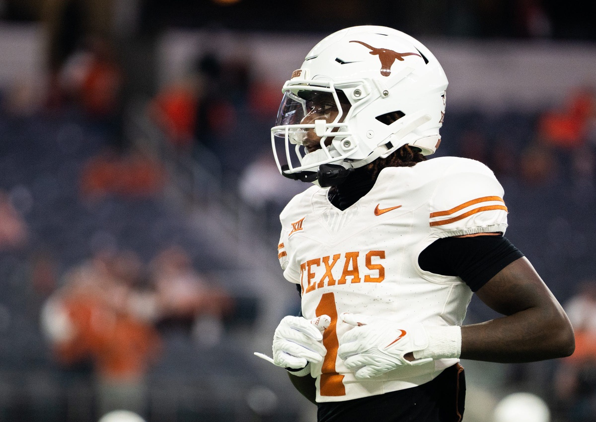 Texas wide receiver Xavier Worthy (1) warms up ahead of the Big 12 Conference Championship game.