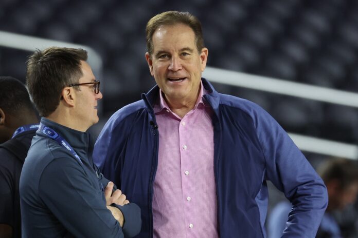 CBS Sports Jim Nantz (right) looks on from the court during a practice session the day before the Final Four of the 2023 NCAA Tournament at NRG Stadium.