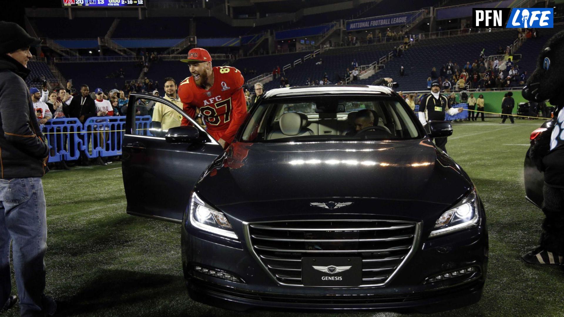 Offensive MVP, AFC tight end Travis Kelce of the Kansas city Chiefs (87) gets into the car he won after they beat the NFC at Citrus Bowl.AFC defeated the NFC 20-13.