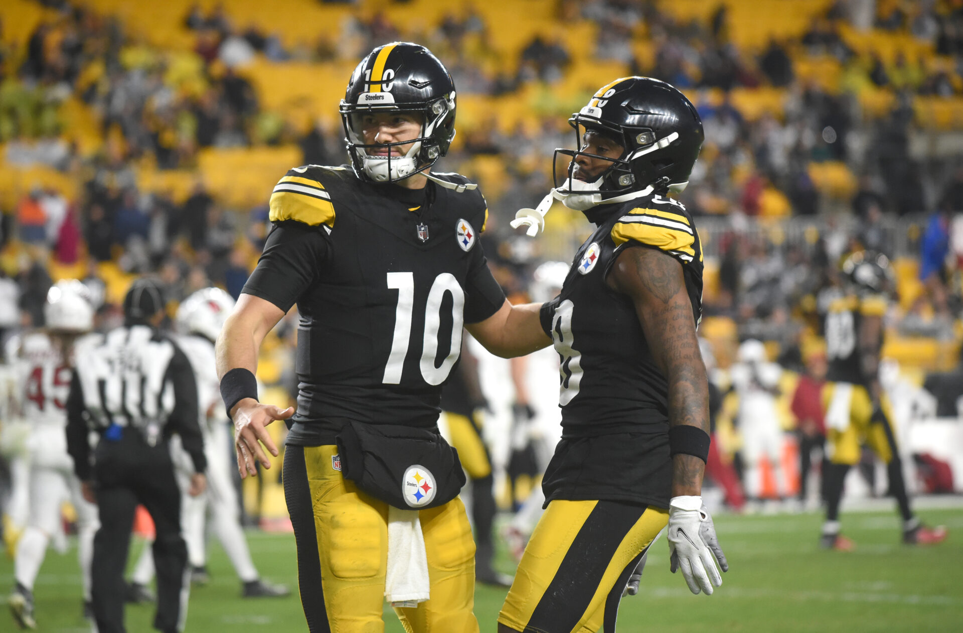 Pittsburgh Steelers quarterback Mitch Trubisky (10) celebrates a touchdown with wide receiver Diontae Johnson (18) as they play the Arizona Cardinals during the fourth quarter at Acrisure Stadium.