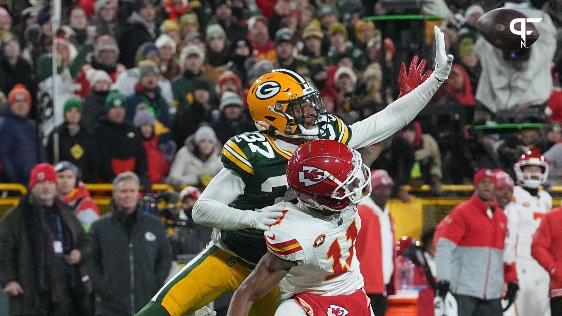 Green Bay Packers cornerback Carrington Valentine (37) bats a way a pass intended for Kansas City Chiefs wide receiver Marquez Valdes-Scantling (11) during the fourth quarter of their game Sunday, December 3, 2023 at Lambeau Field in Green Bay, Wisconsin.