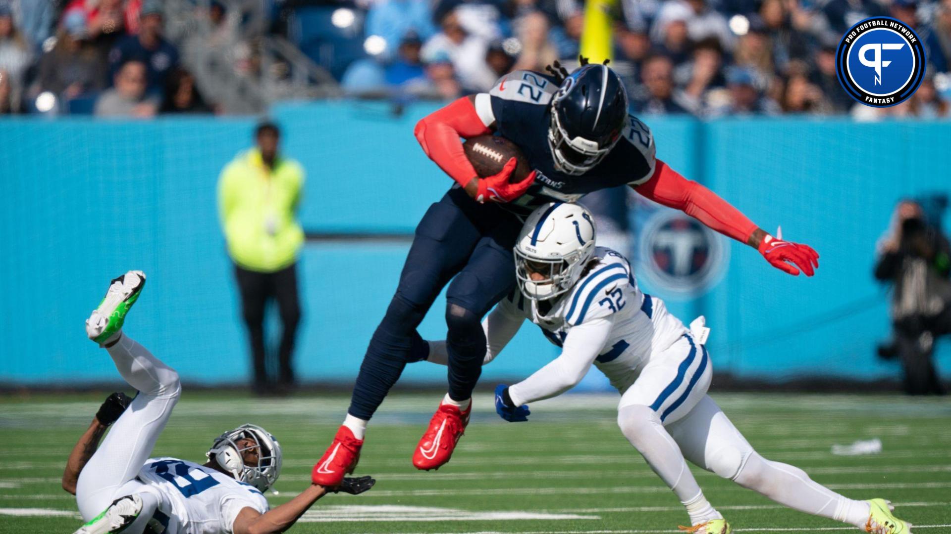 Indianapolis Colts safety Julian Blackmon (32) tackles Tennessee Titans running back Derrick Henry (22) after he gained a first down during their game at Nissan Stadium.