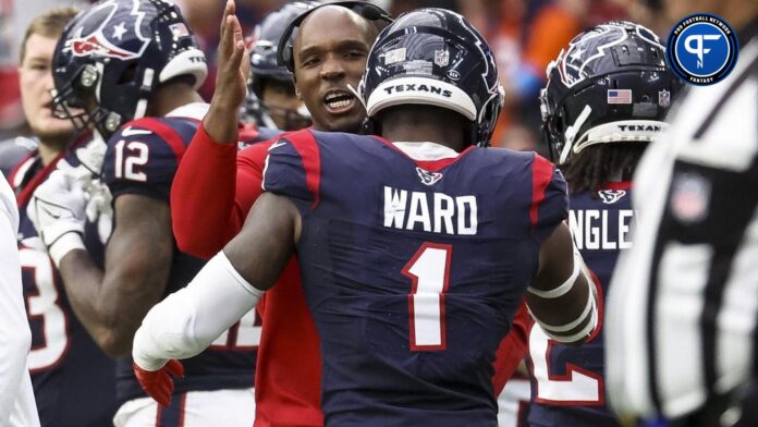 Houston Texans head coach DeMeco Ryans reacts with safety Jimmie Ward (1) after a play during the second quarter against the Denver Broncos at NRG Stadium.