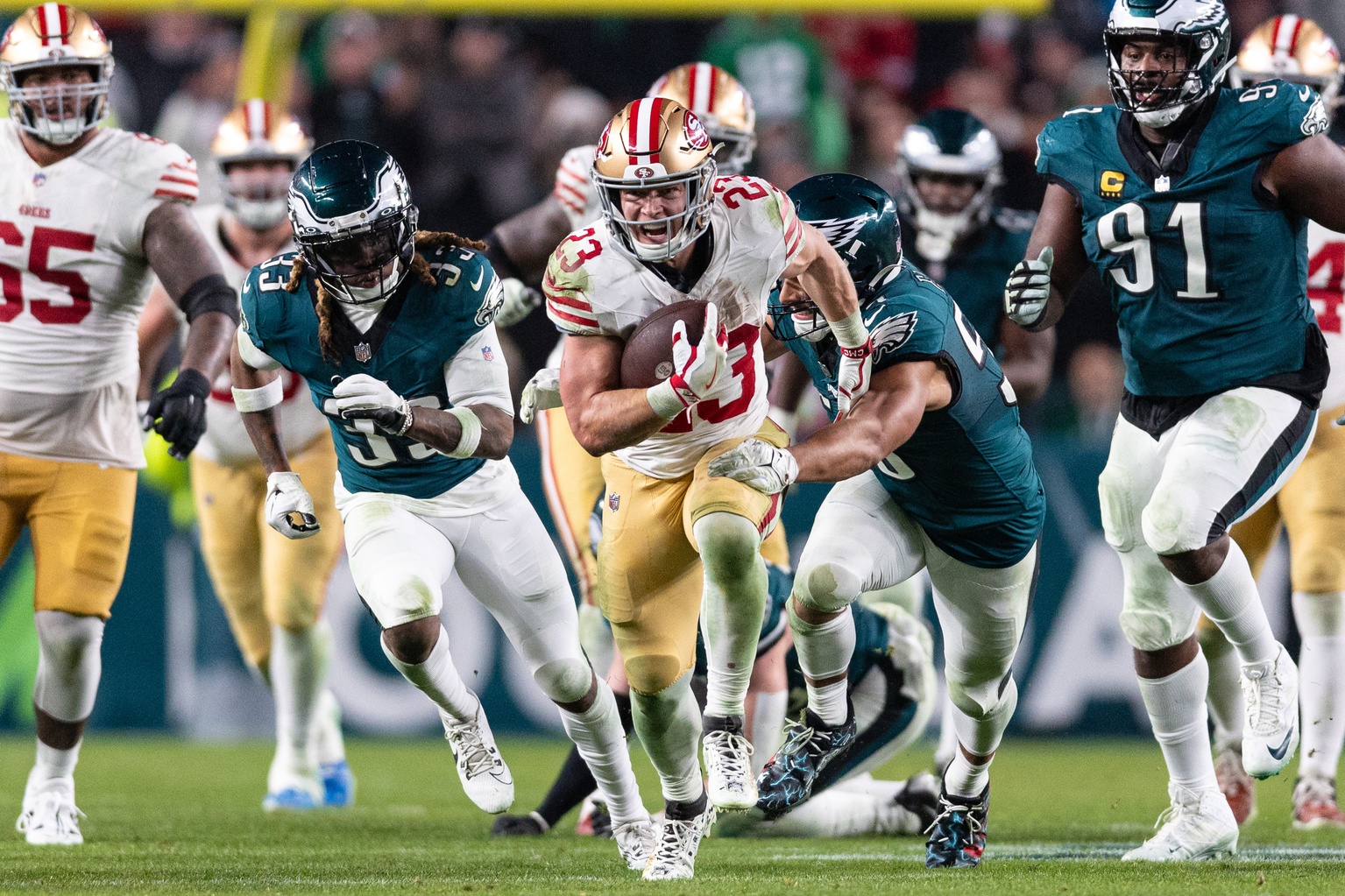 San Francisco 49ers running back Christian McCaffrey (23) runs with the ball against the Philadelphia Eagles during the third quarter at Lincoln Financial Field.