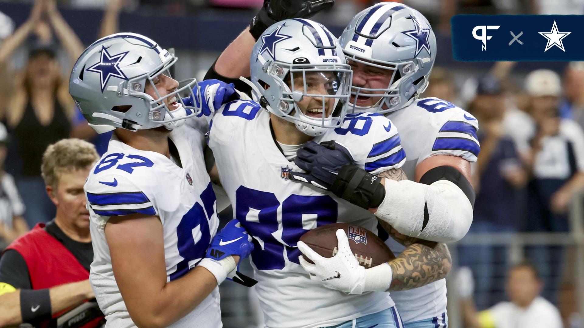 Dallas Cowboys tight end Peyton Hendershot (89) celebrates with teammates after catching a touchdown pass during the fourth quarter against the Detroit Lions at AT&T Stadium.