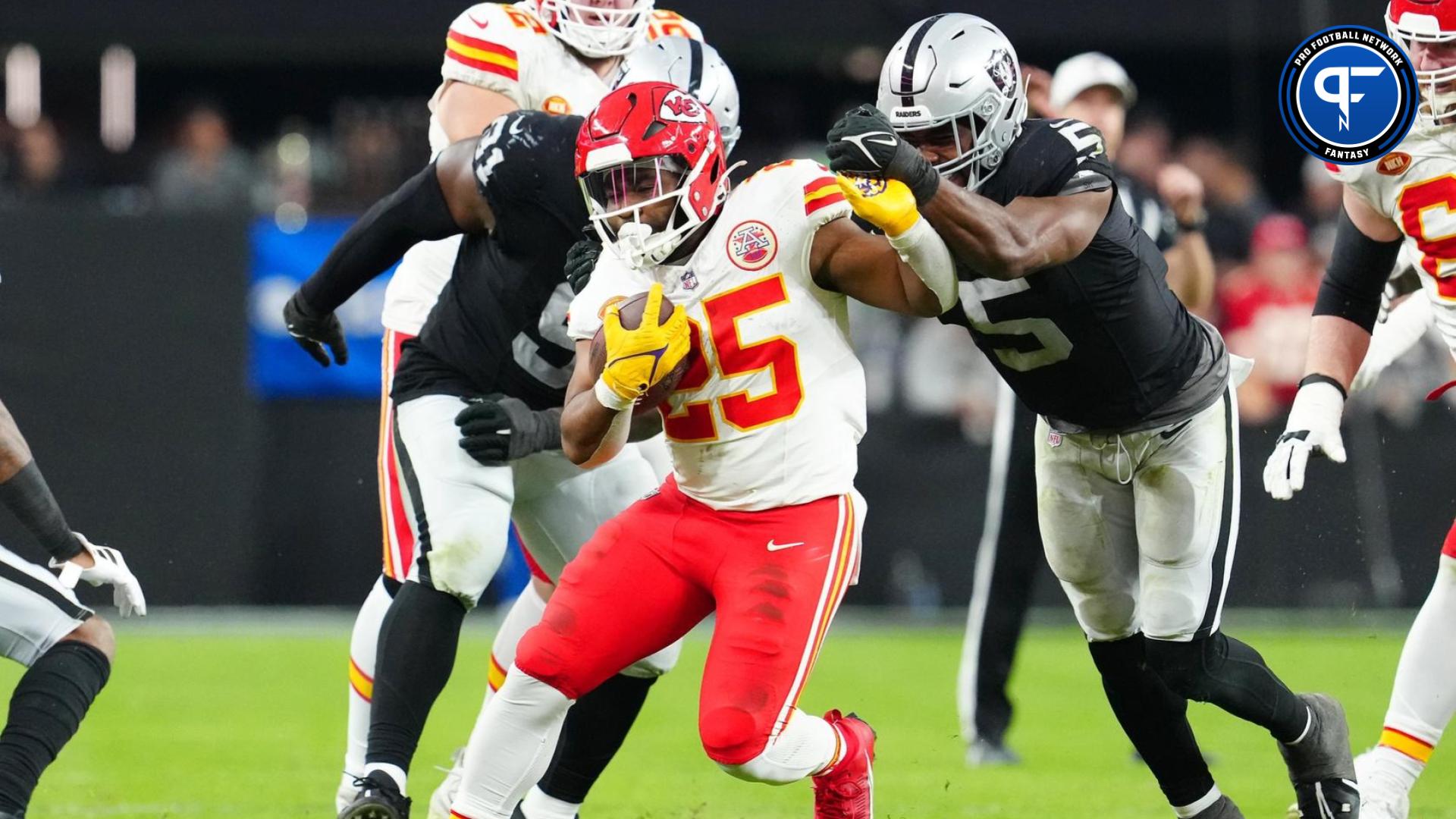 Kansas City Chiefs running back Clyde Edwards-Helaire (25) is tackled by Las Vegas Raiders linebacker Divine Deablo (5) during the third quarter at Allegiant Stadium.