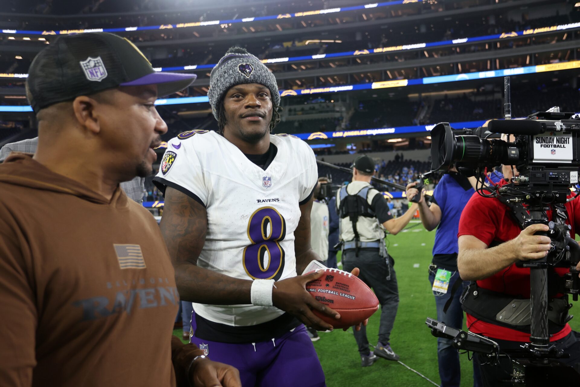 Baltimore Ravens QB Lamar Jackson (8) on the field after a victory over the Los Angeles Chargers.