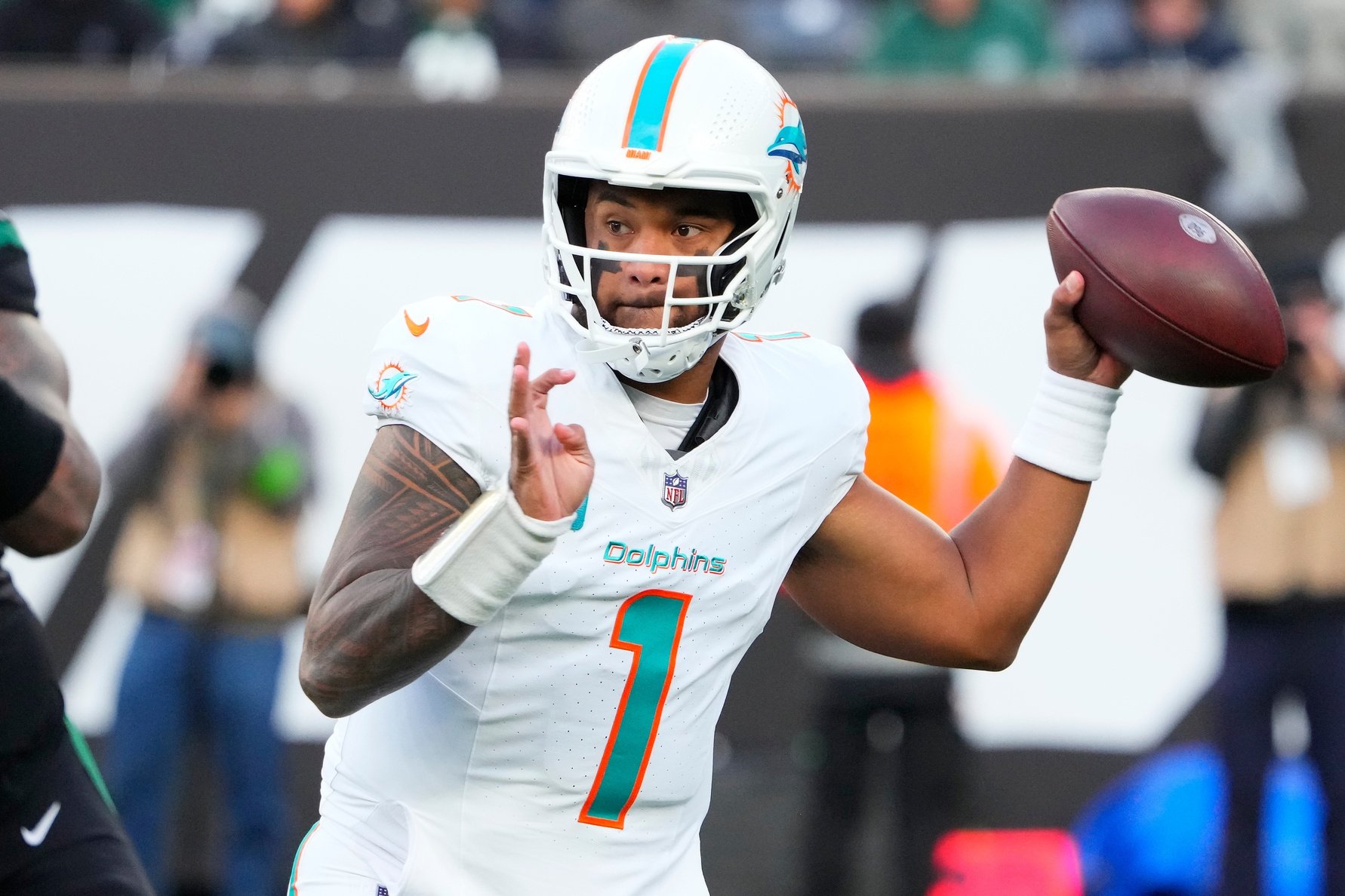 Miami Dolphins quarterback Tua Tagovailoa (1) throws a pass during the game against the New York Jets at MetLife Stadium.