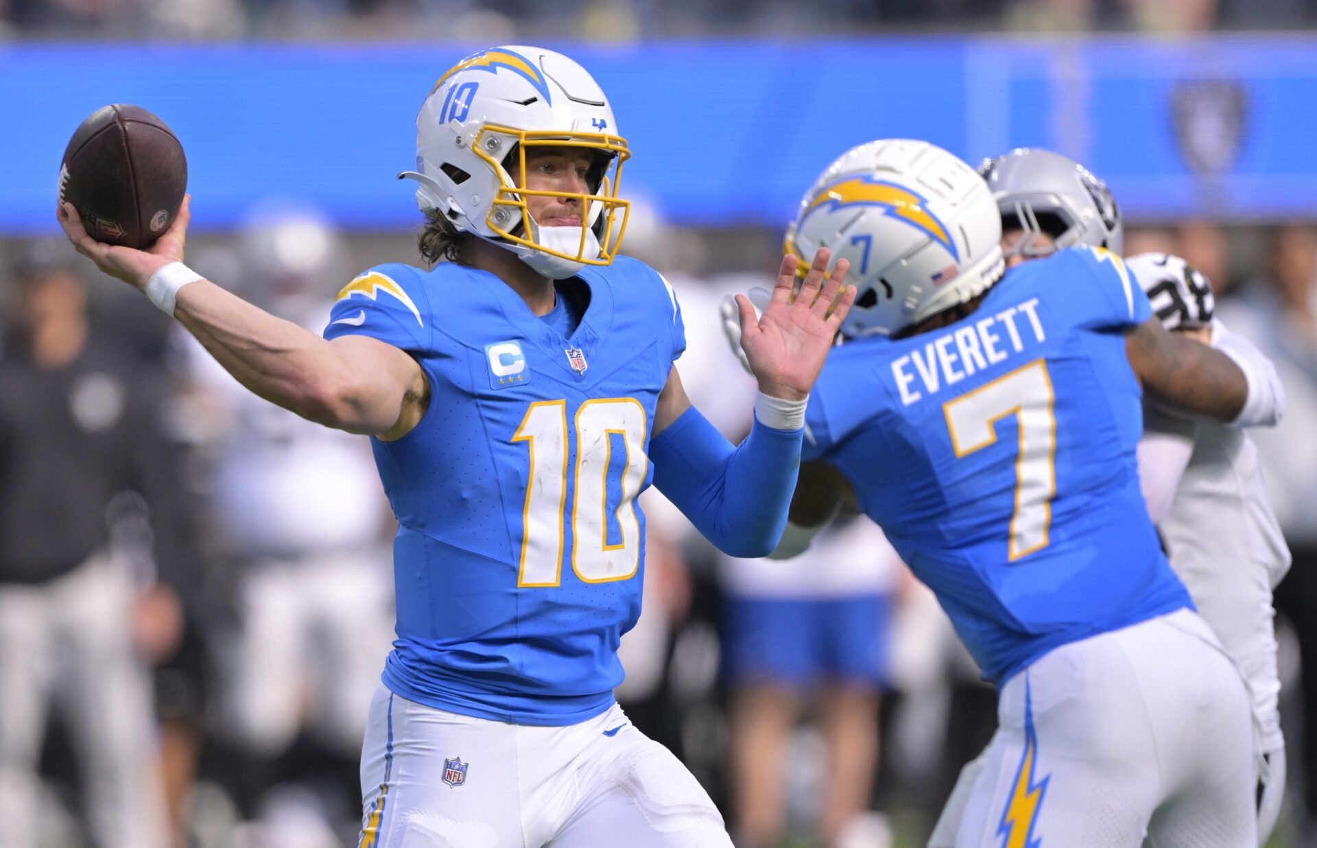 Los Angeles Chargers quarterback Justin Herbert (10) throws a pass in the second half against the Las Vegas Raiders at SoFi Stadium.