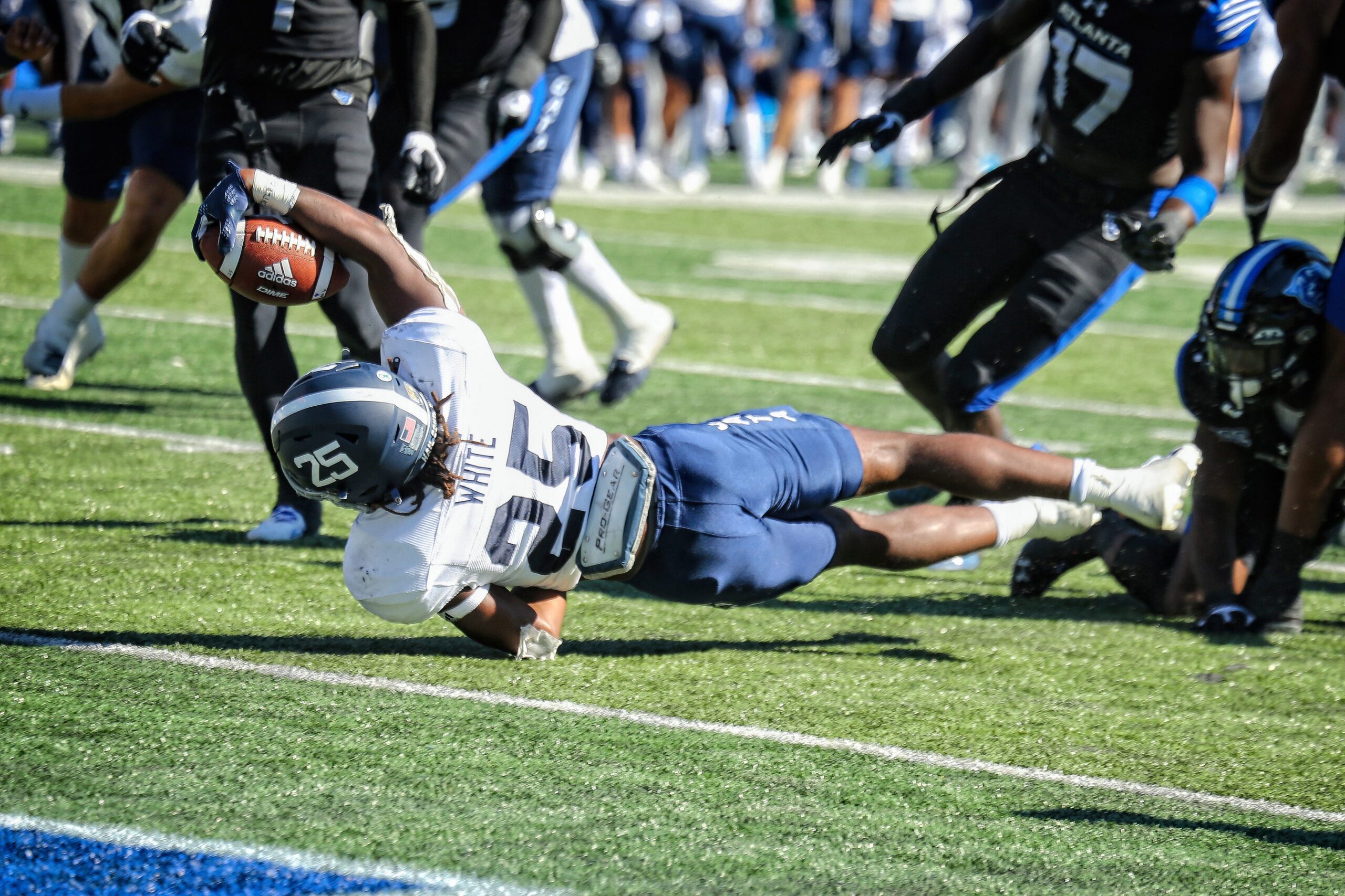 Georgia Southern running back Jalen White stretches for the end zone against Georgia State on Saturday at Center Parc Stadium in Atlanta.