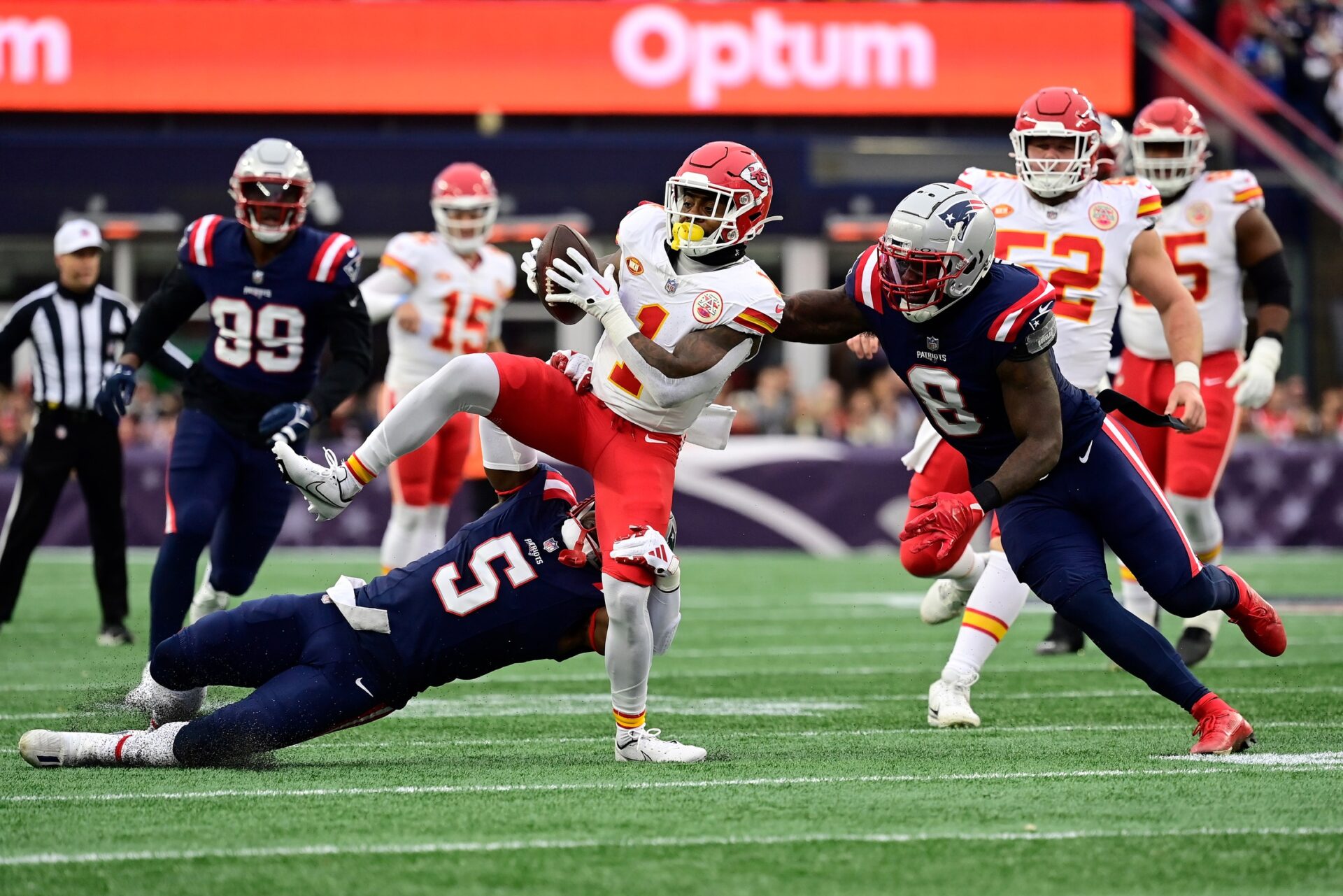 Kansas City Chiefs running back Jerick McKinnon (1) gets tackled by New England Patriots safety Jabrill Peppers (5) during the first half at Gillette Stadium.