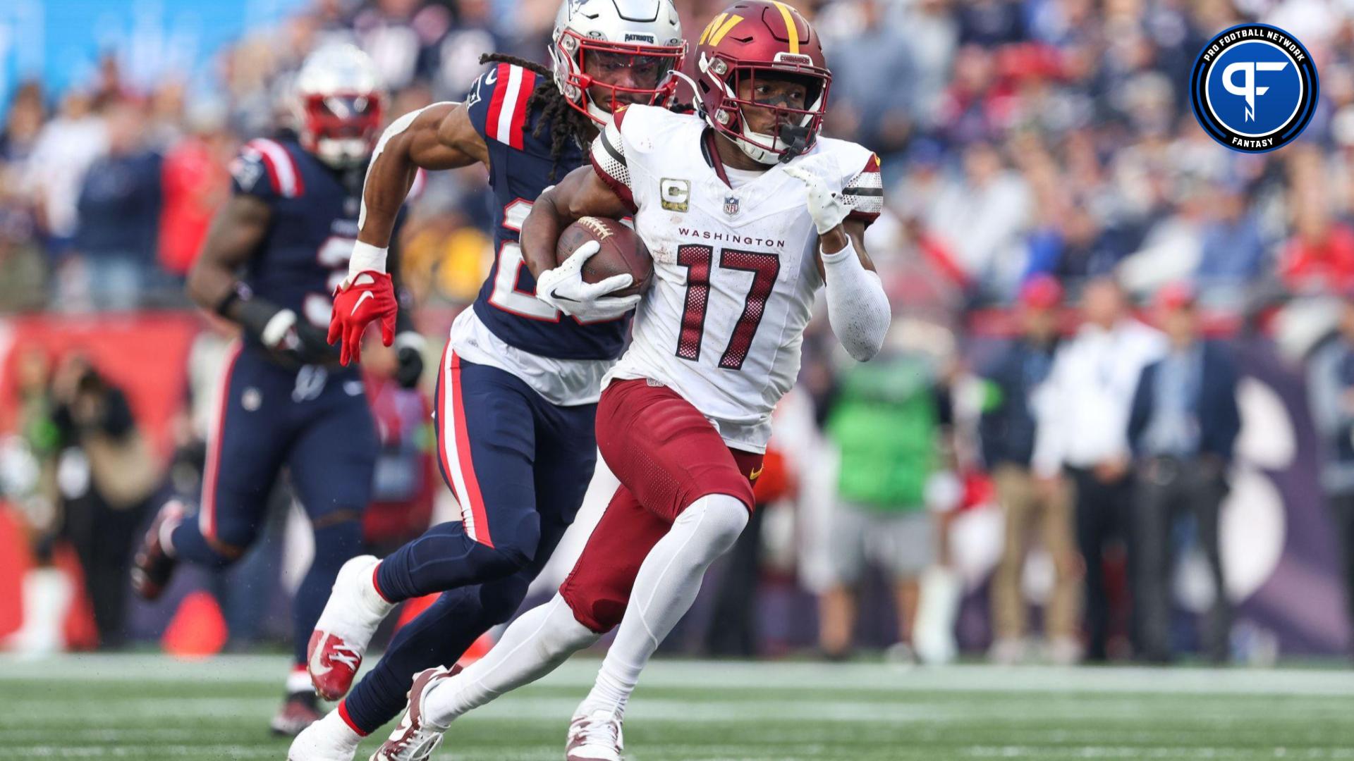 Washington Commanders receiver Terry McLaurin (17) runs the ball during the second half against the New England Patriots at Gillette Stadium.