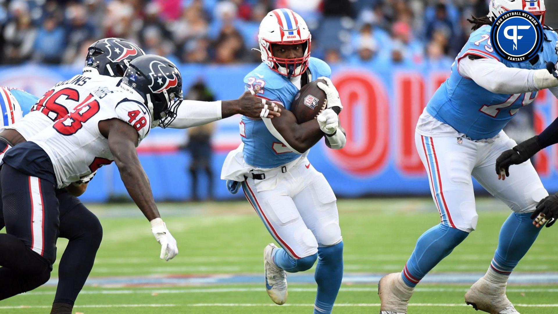 Tennessee Titans running back Tyjae Spears (32) runs the ball against the Houston Texans during the second half at Nissan Stadium.