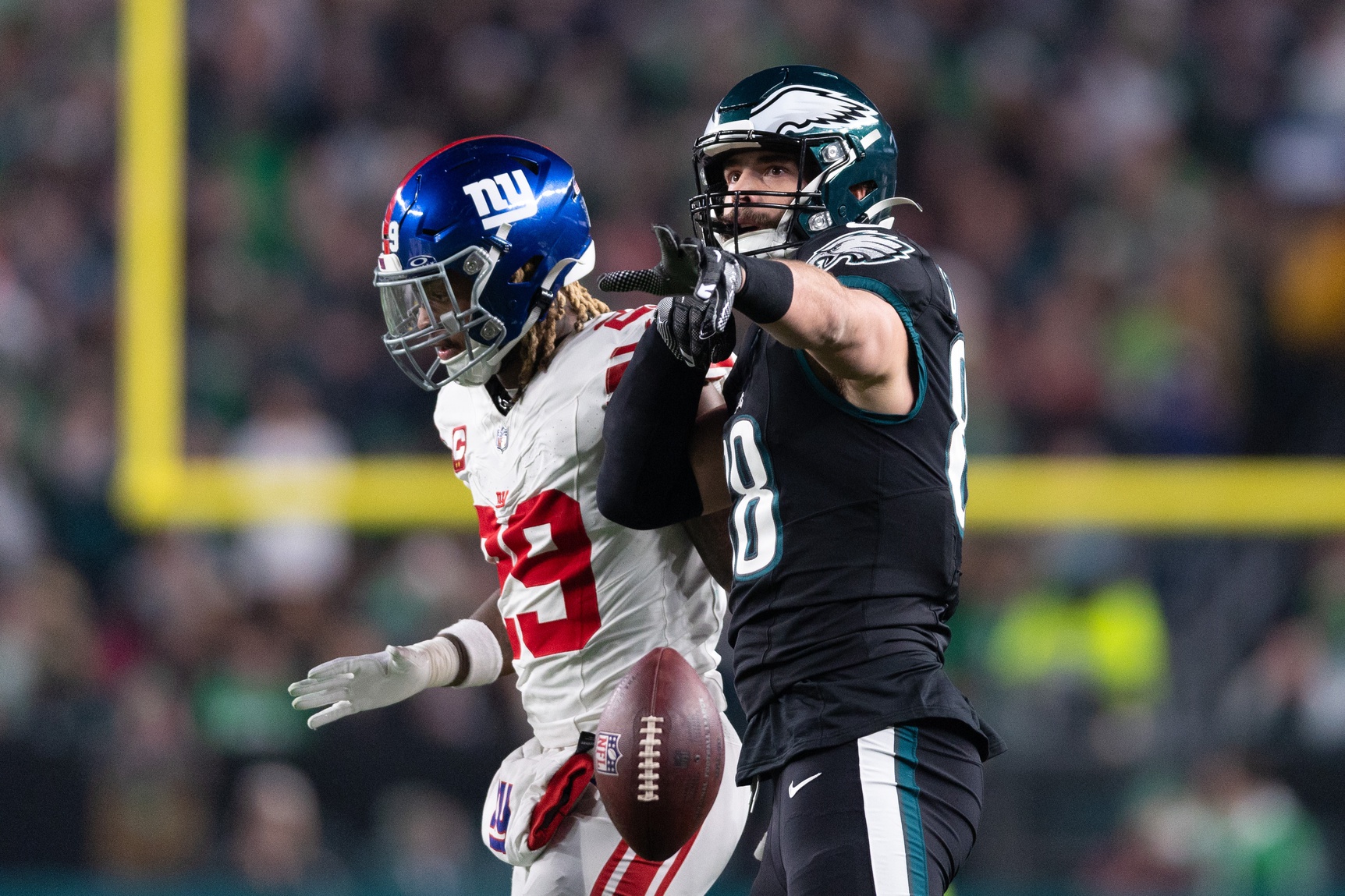 Philadelphia Eagles tight end Dallas Goedert (88) reacts in front of New York Giants safety Xavier McKinney (29) after his first down catch during the first quarter at Lincoln Financial Field.