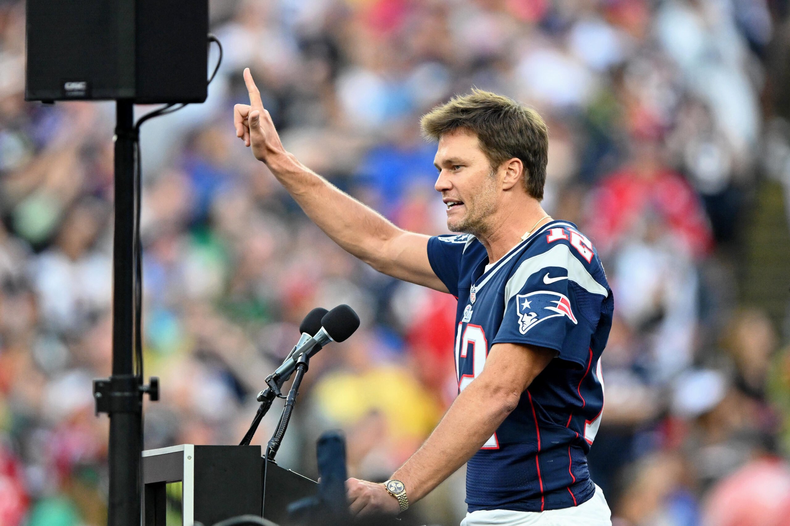 New England Patriots former quarterback Tom Brady speaks during a halftime ceremony in his honor during the game between the Philadelphia Eagles and New England Patriots at Gillette Stadium.
