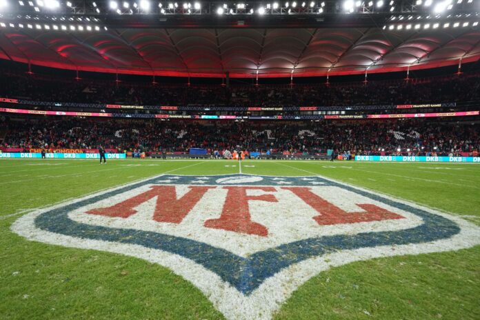 The NFL shield logo at midfield during an NFL International Series game at Deutsche Bank Park.