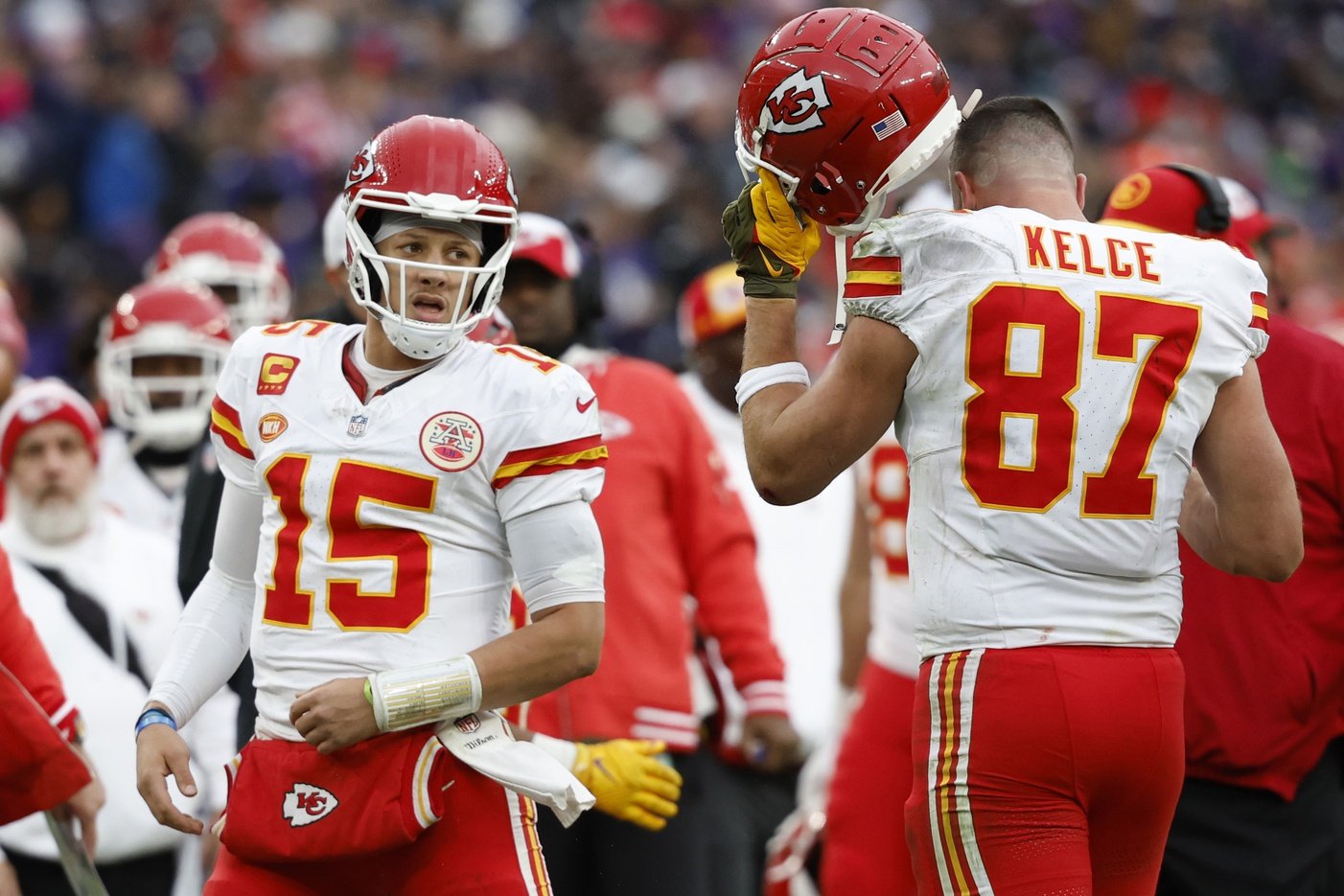 Kansas City Chiefs quarterback Patrick Mahomes (15) celebrates with Chiefs tight end Travis Kelce (87) after a touchdown against the Baltimore Ravens in the AFC Championship football game at M&T Bank Stadium.