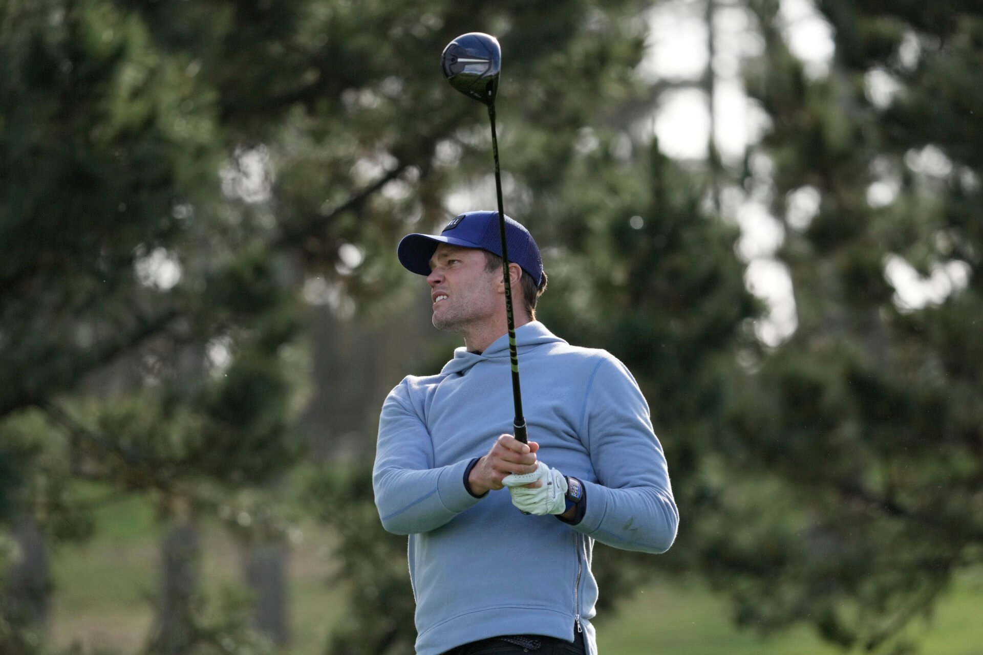 NFL former quarterback Tom Brady hits his tee shot on the 11th hole during the first round of the AT&T Pebble Beach Pro-Am golf tournament at Spyglass Hill Golf Course.