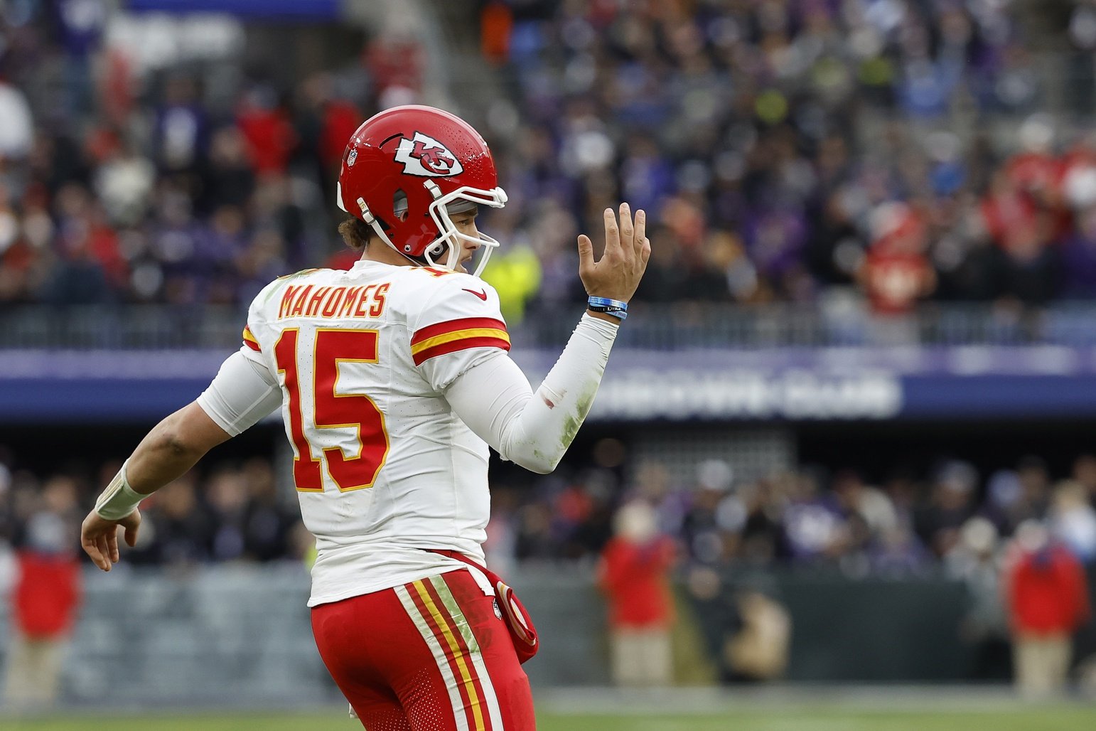 Kansas City Chiefs QB Patrick Mahomes (15) reacts on the field against the Baltimore Ravens.