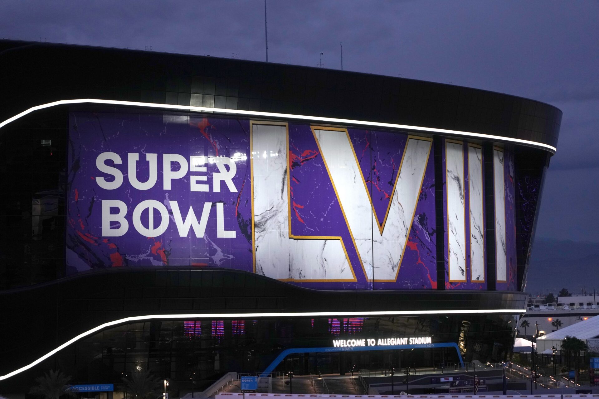 A general overall view of the Super Bowl 58 roman numerals logo on the Allegiant Stadium facade.