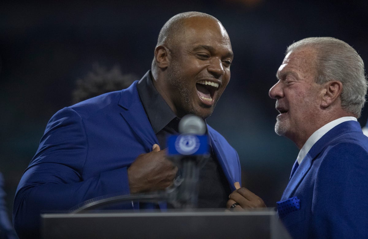 Dwight Freeney, Ring of Honor recipient, laughs with Jim Irsay.