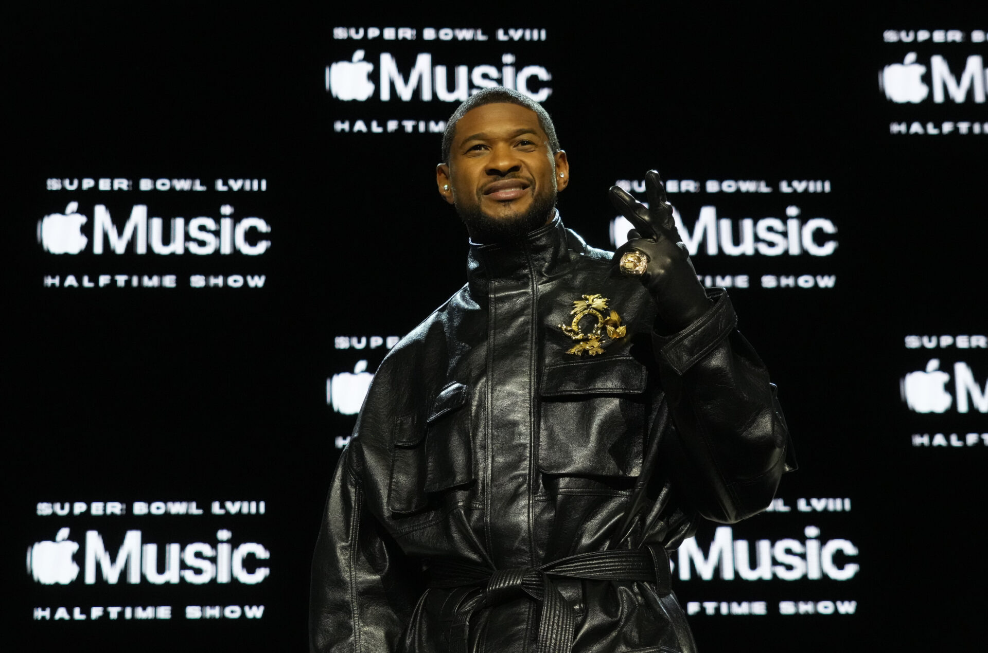 Recording artist Usher poses for photos during the Super Bowl LVIII pregame and halftime show press conference at the Mandalay Bay Convention Center.