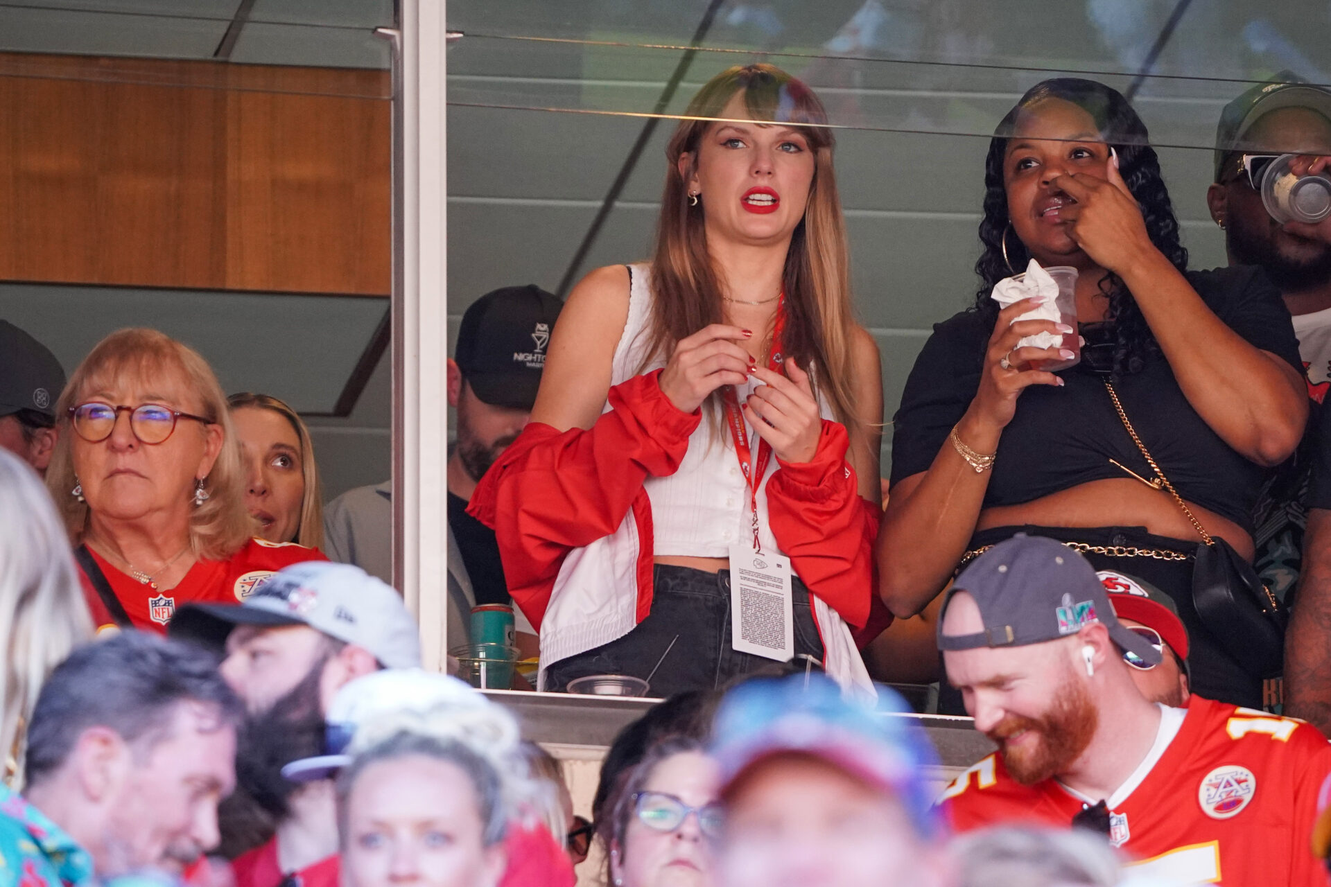 Recording artist Taylor Swift cheers against the Chicago Bears during the game at GEHA Field at Arrowhead Stadium.