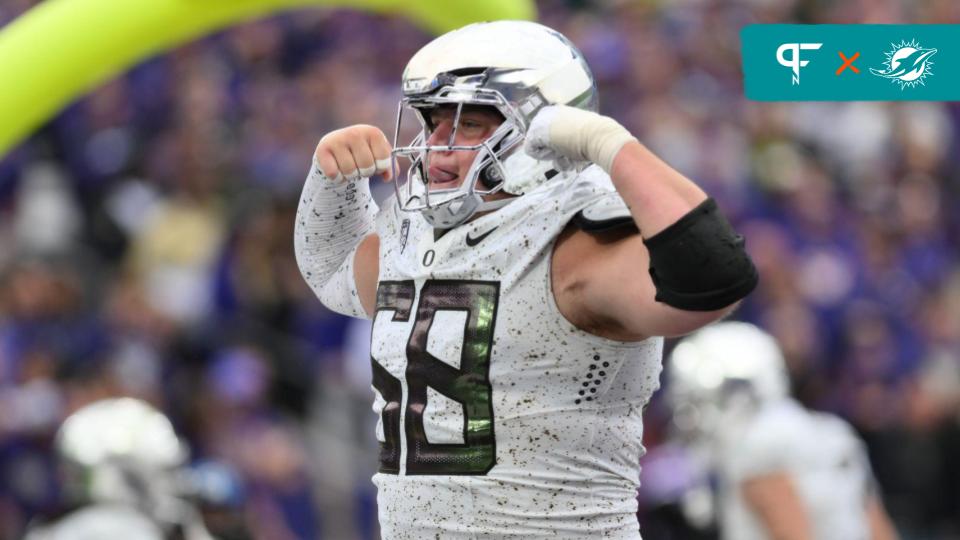 Oregon Ducks offensive lineman Jackson Powers-Johnson (58) celebrates after the Ducks scored a touchdown against the Washington Huskies during the second half at Alaska Airlines Field at Husky Stadium.