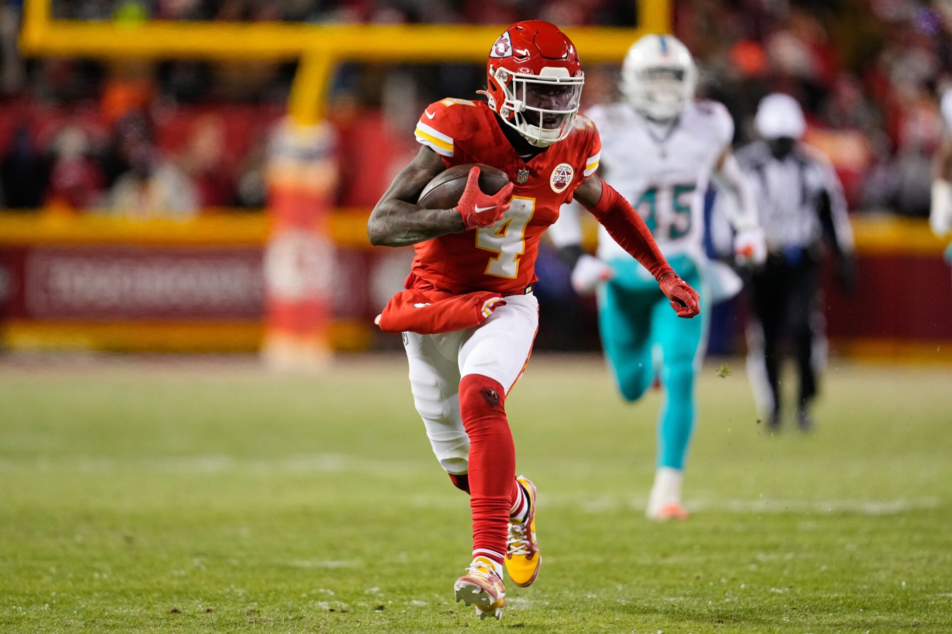 Kansas City Chiefs WR Rashee Rice (4) runs after the catch against the Miami Dolphins.