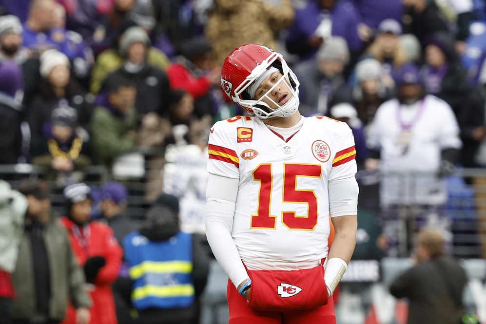 Kansas City Chiefs quarterback Patrick Mahomes (15) looks on from the field prior to the AFC Championship football game against the Baltimore Ravens at M&T Bank Stadium.