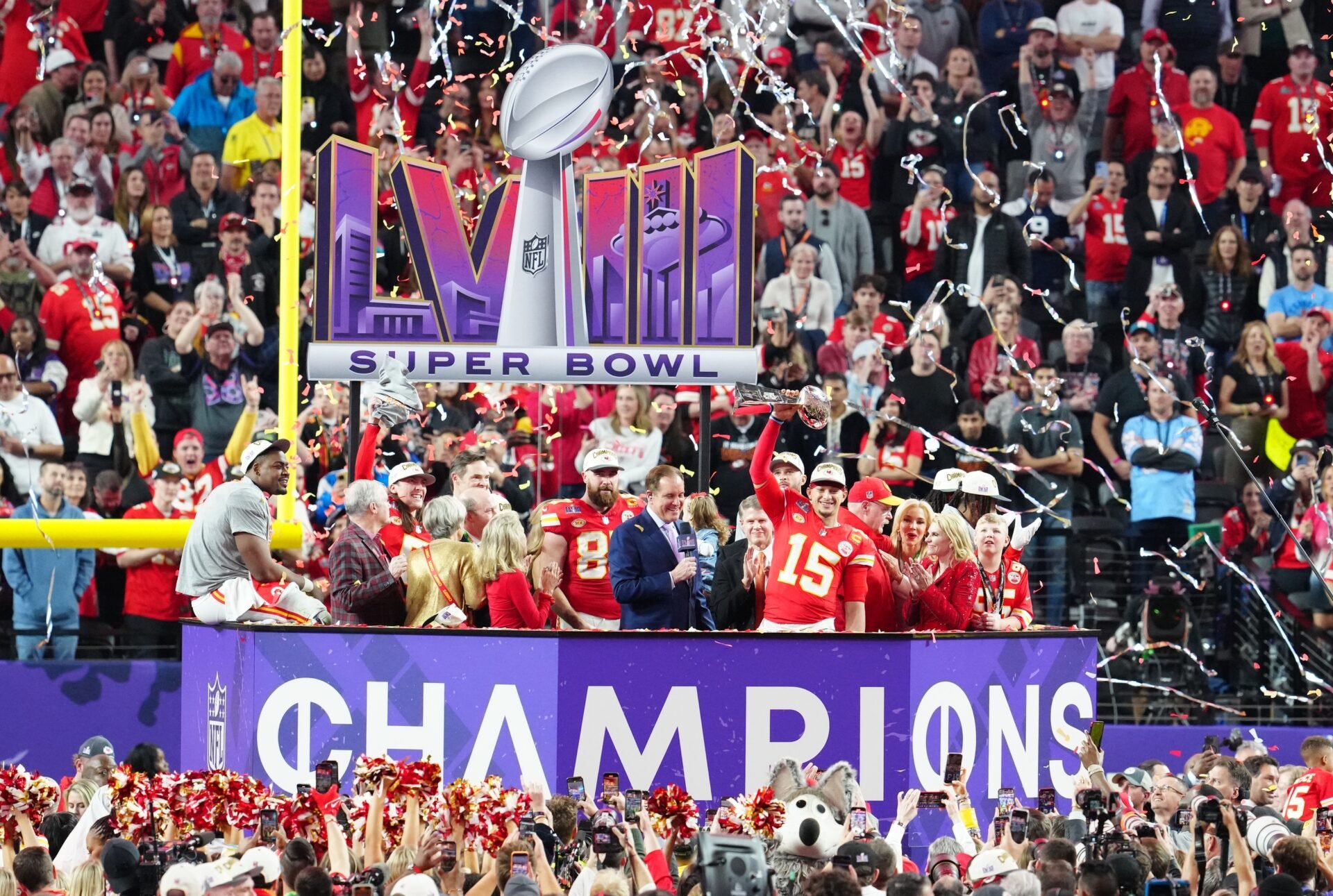 Kansas City Chiefs quarterback Patrick Mahomes (15) hoists the Vince Lombardi Trophy after defeating the San Francisco 49ers in Super Bowl LVIII at Allegiant Stadium.