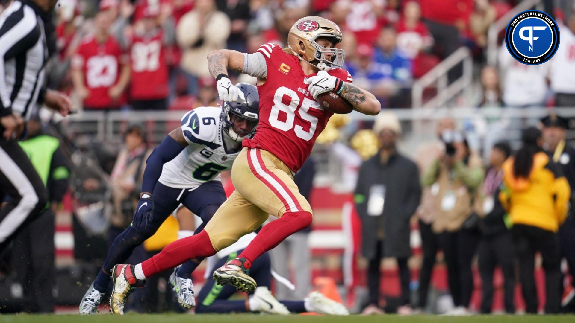 San Francisco 49ers tight end George Kittle (85) scores a touchdown in front of Seattle Seahawks safety Quandre Diggs (6) in the fourth quarter at Levi's Stadium.