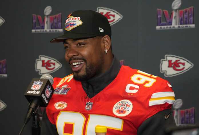 Chris Jones Announces Return to Chiefs at Super Bowl Parade -- 'I Ain't  Going Nowhere Baby!'