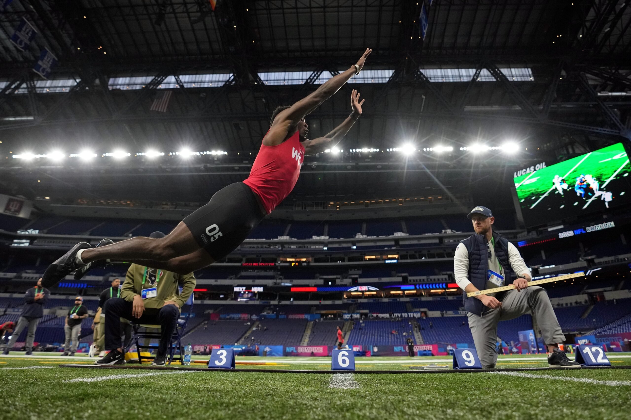South Carolina wide receiver Jalen Brooks (WO05) participates in the broad jump at Lucas Oil Stadium.