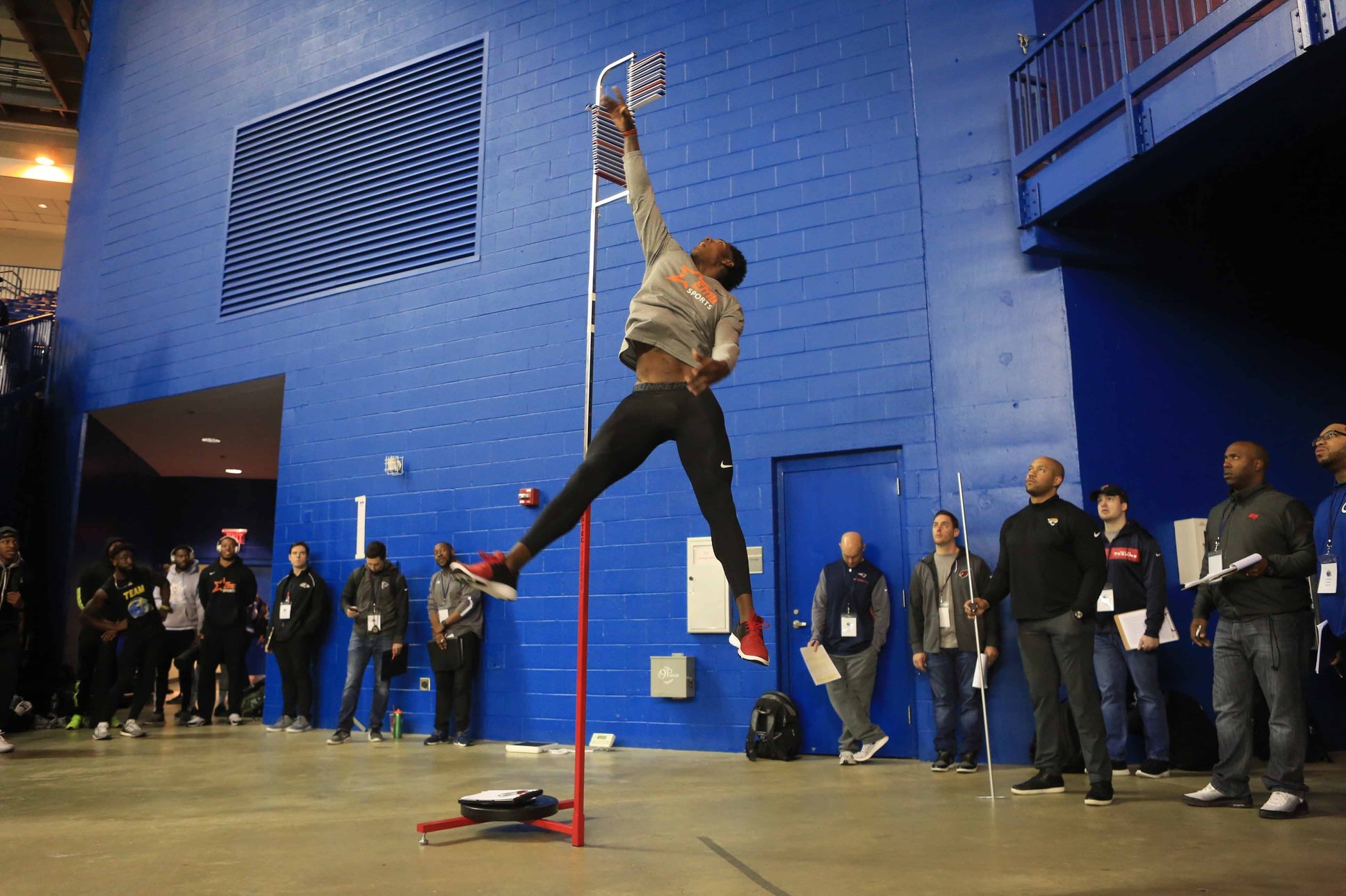 Joe Walker takes his turn at the vertical jump in front of NFL scouts and coaches at the University of Delaware Friday morning during Delaware Pro Day.