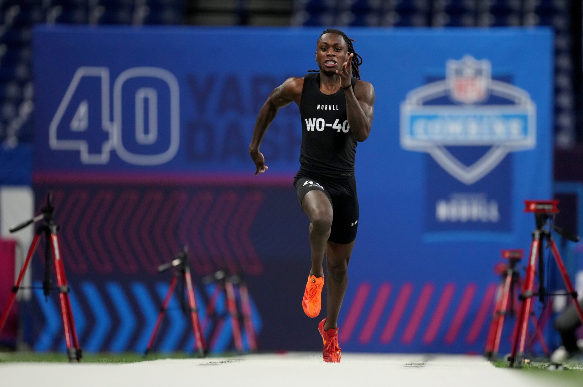Texas wide receiver Xavier Worthy (WO40) ran an official time of 4.21 seconds to set a combine record during the 2024 NFL Combine at Lucas Oil Stadium.