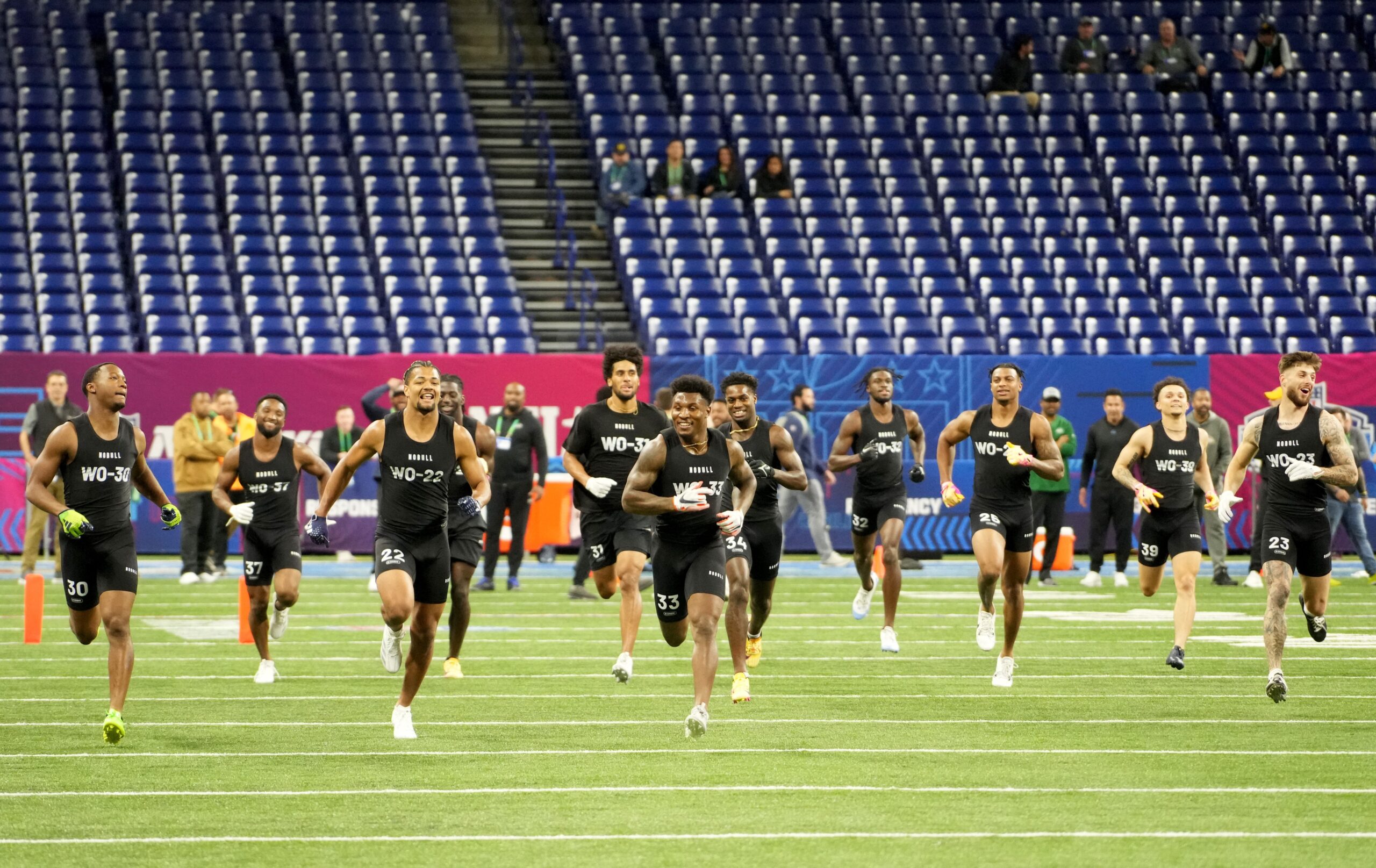 Wide receivers celebrate during the 2024 NFL Combine at Lucas Oil Stadium.