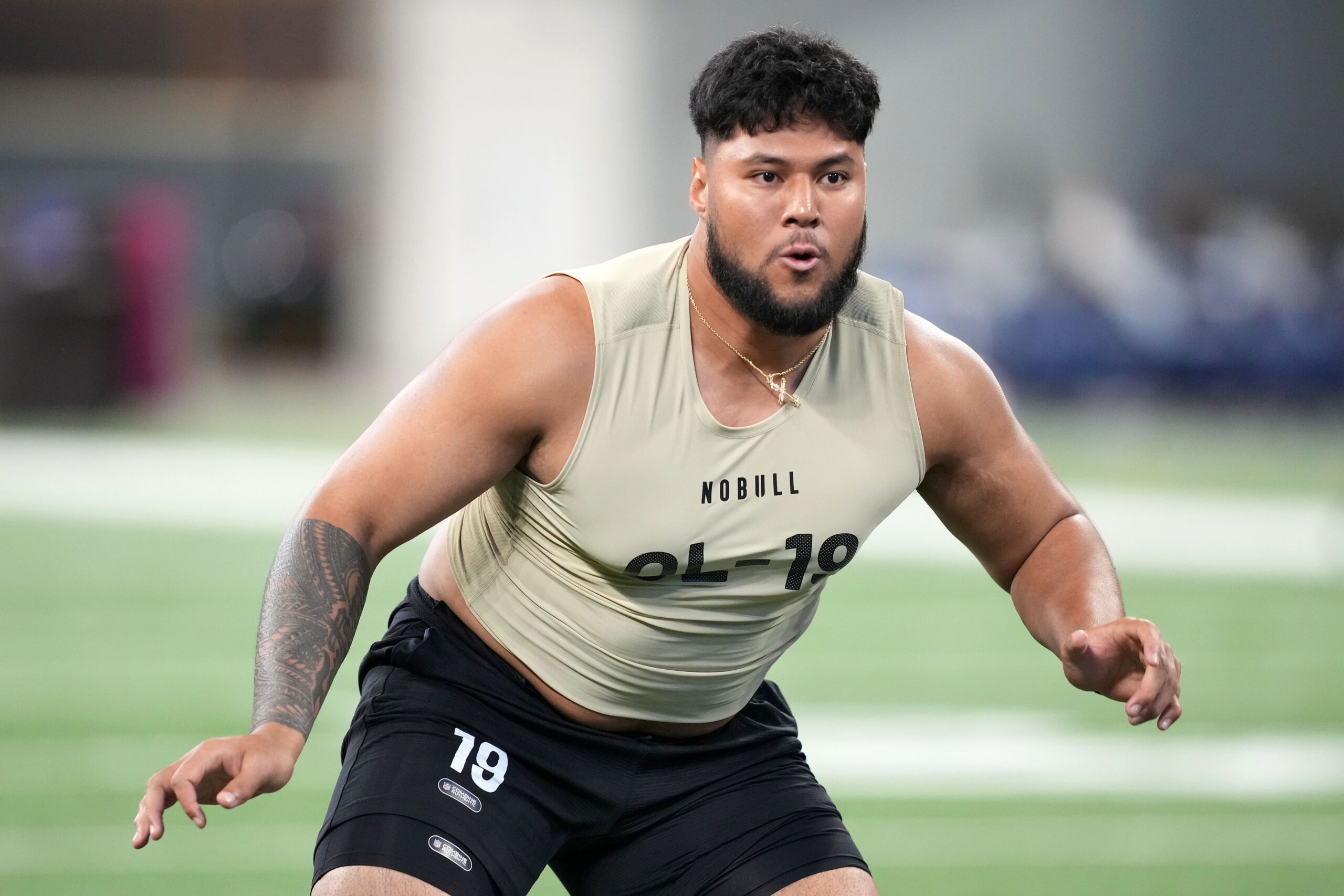 Washington offensive lineman Troy Fautanu (OL19) during the 2024 NFL Combine at Lucas Oil Stadium.