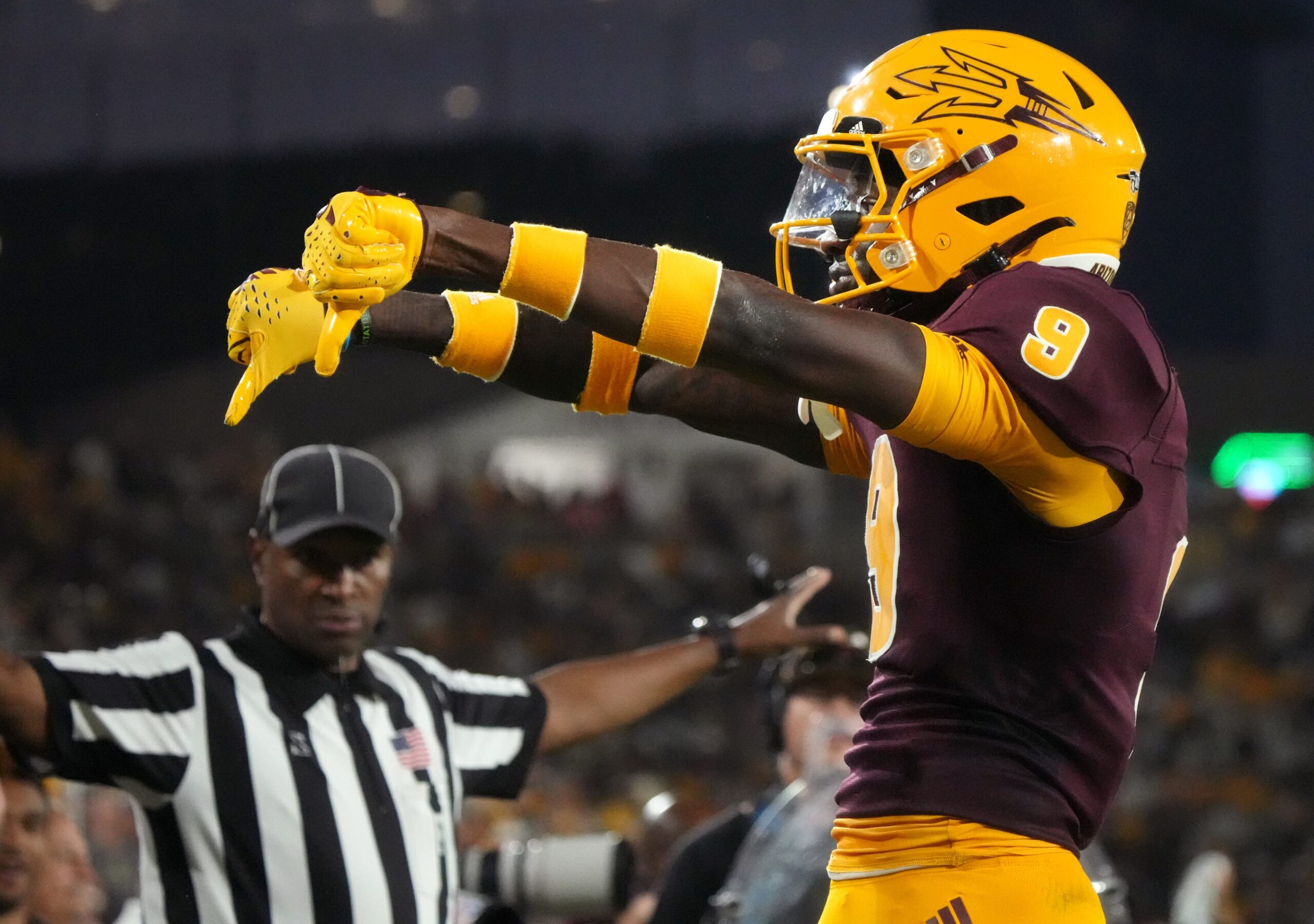 ASU Sun Devils defensive back Ro Torrence (9) celebrates his stop against the Colorado Buffaloes at Mountain America Stadium.