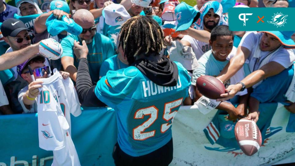 Miami Dolphins cornerback Xavien Howard (25) signs autographs for fans at training camp at Baptist Health Training Complex, Sunday, July 30, 2023 in Miami Gardens.