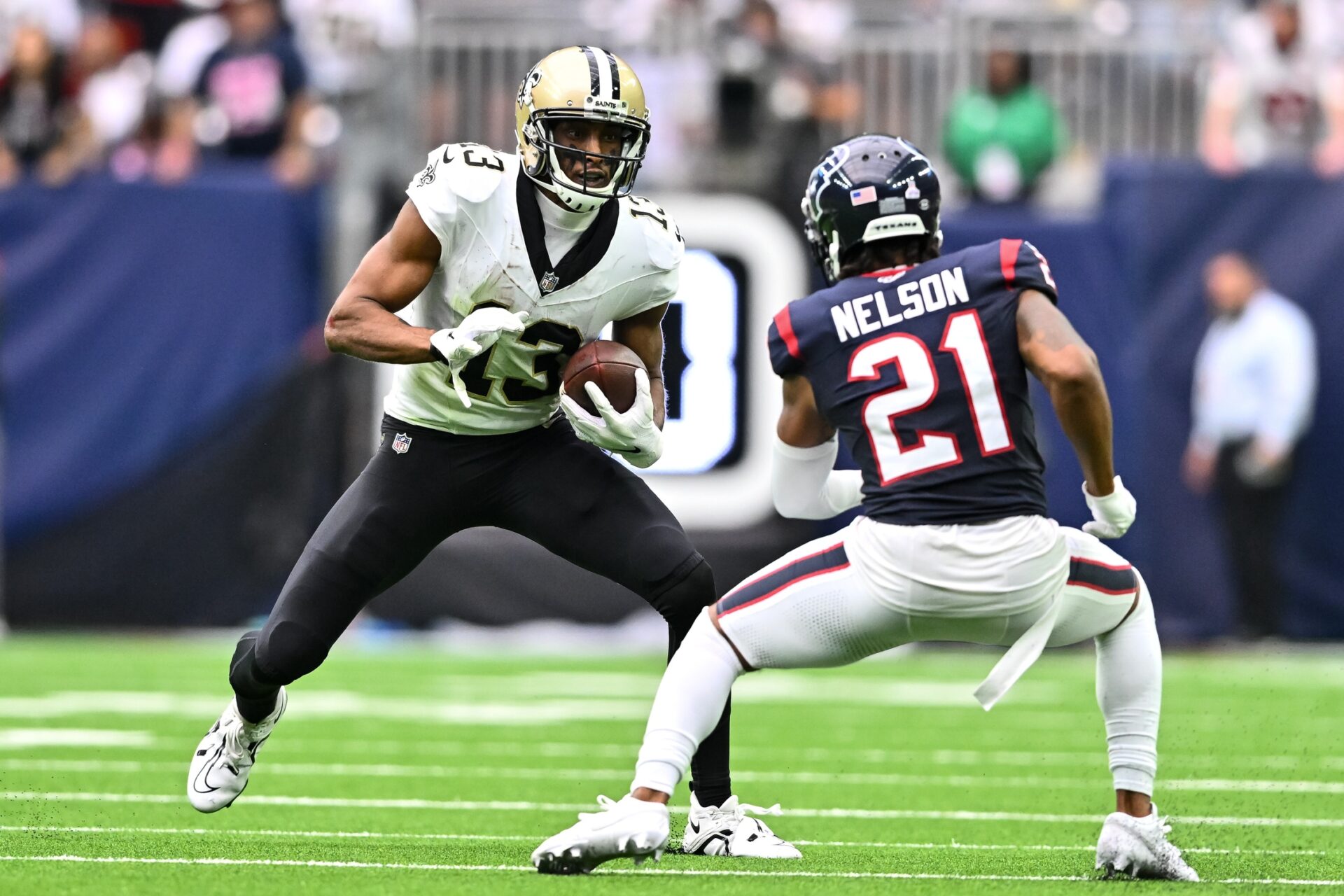 New Orleans Saints WR Michael Thomas (13) looks to make a move against the Houston Texans.