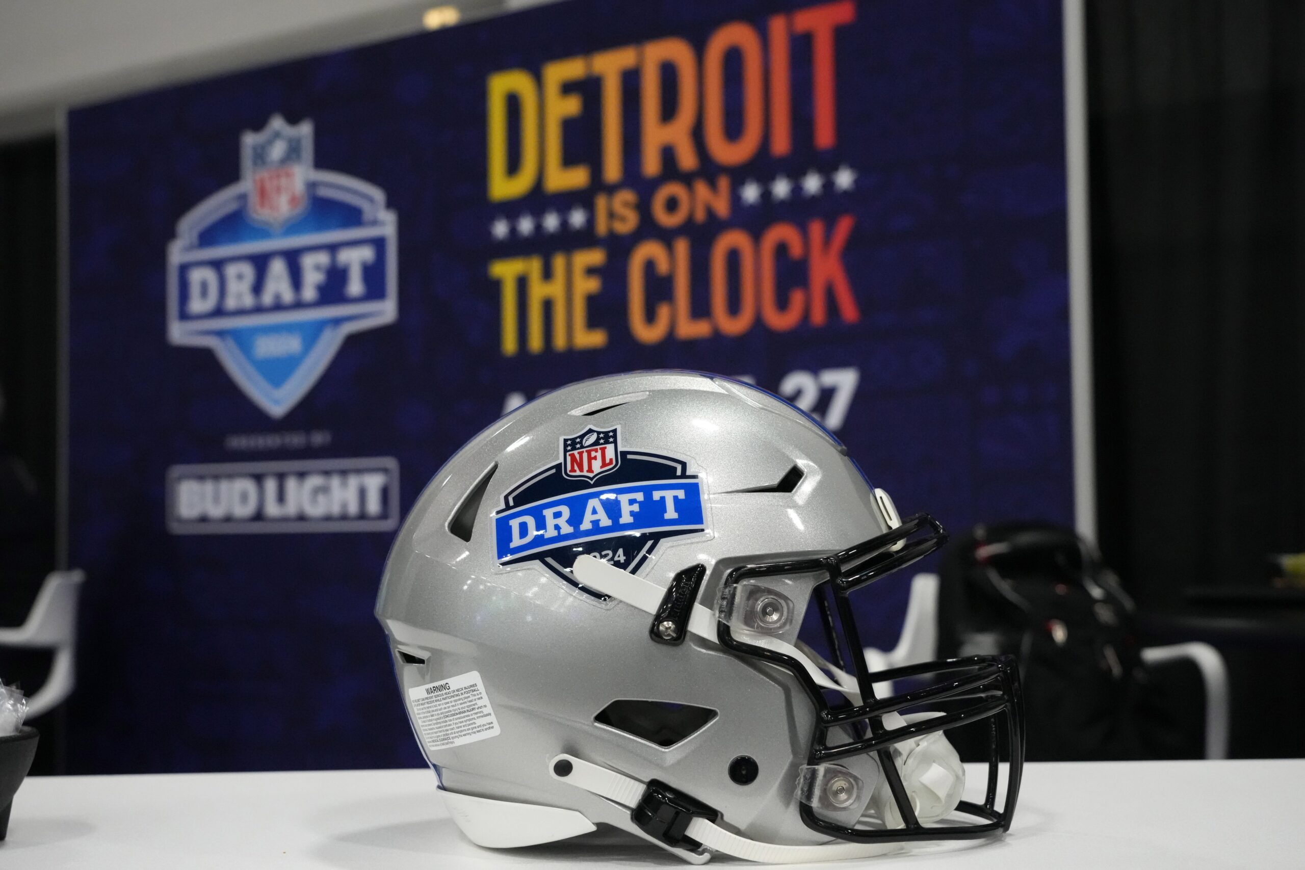 The NFL Draft in Detroit helmet on display at the Super Bowl 58 media center.
